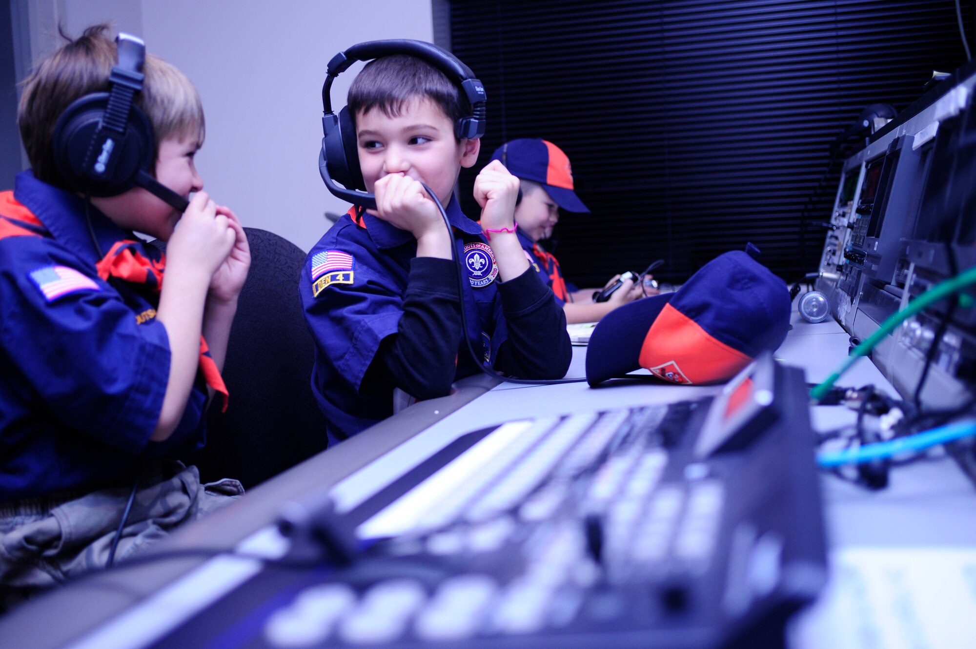 VANDENBERG AIR FORCE BASE, Calif. -- Vandenberg Cub Scout Pack 102 learns about live broadcasts in the television control room in the 30th Space Wing Public Affairs Office here Wednesday, Feb. 1, 2012. The PA staff helped the scouts earn their news and media merit badges. (U.S. Air Force photo/Staff Sgt. Andrew Satran) 