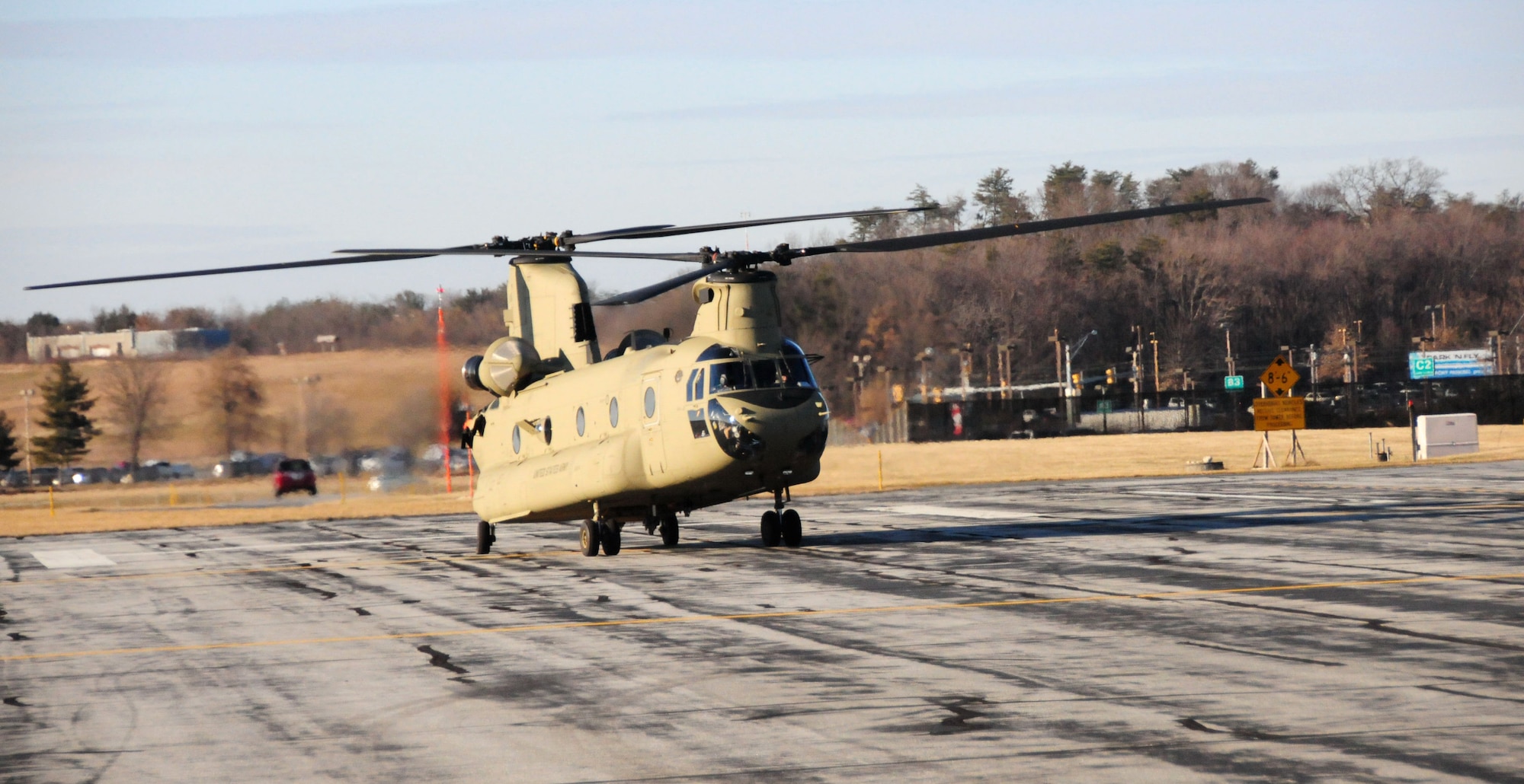 One of two Connecticut Army National Guard CH-47 Chinooks lands at a general aviation facility in Baltimore to pick up approximately 25 Connecticut Air National Guardsmen with the 103rd Security Forces Squadron at Bradley Air National Guard Base, East Granby, Conn., as they return home from Afghanistan Jan. 30, 2012. (U.S. Air Force photo by Tech. Sgt. Joshua Mead)