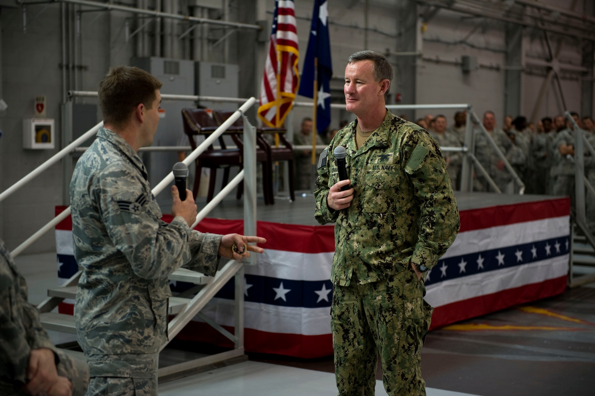 U.S. Navy Adm. William McRaven, commander of the U.S. Special Operations Command, listens to a question by a U.S. Air Force Airman at the Commando Hangar on Hurlburt Field, Fla., Jan., 31, 2012. The admiral answered questions by enlisted personnel pertaining to the preservation of the force. (U.S. Air Force photo/Airman 1st Class Gustavo Castillo)(Released)