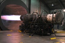 Technicians from the 4th Component Maintenance Squadron hush house run an uninstalled aircraft engine simulated live burn test on Seymour Johnson Air Force Base, N.C., Jan. 30, 2012. The simulated live burn tests an engine’s maximum thrust and provides mechanics information that allows them to determine what repairs are needed. (U.S. Air Force photo/Senior Airman Whitney Stanfield/Released)