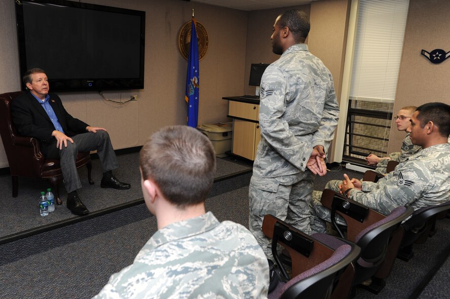 Senior Airmen Sorhaindo Peter, 811th Security Forces Squadron leader, Joint Base Andrews, Md., asks retired Chief Master Sgt. of the Air Force Rodney McKinley a question regarding the future of the Air Force, Jan. 27, during McKinley’s visit on base. The Airman Leadership School students and instructors had the opportunity to talk with the retired CMSAF about leadership, supervision and their coming responsibilities as non-commissioned officers. (U.S. Air Force photo by Staff Sgt. Christopher Ruano)