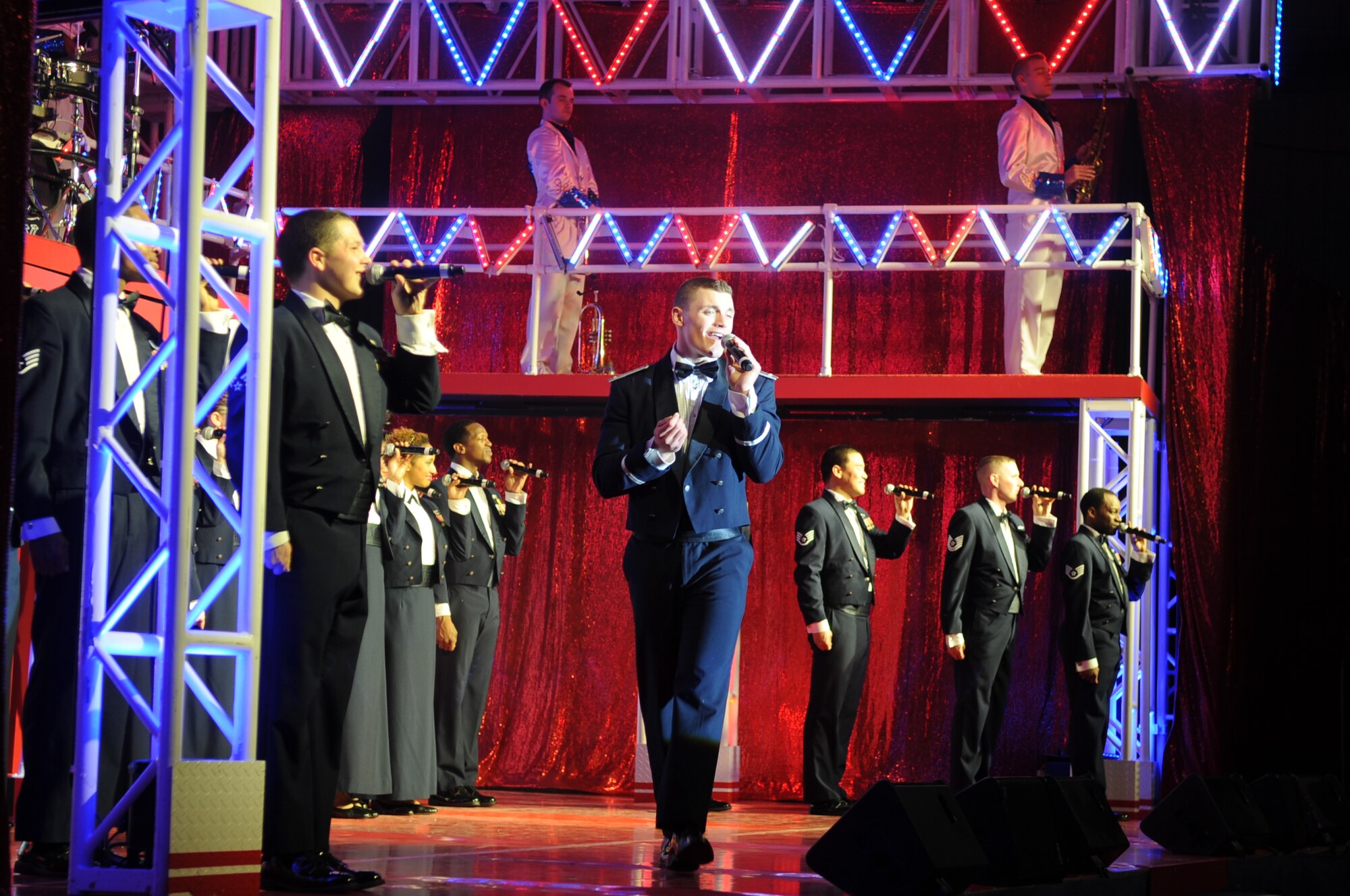 U.S. Air Force 1st Lt. Robert Doyle performs during a Tops in Blue musical showcase at Seymour Johnson Air Force Base, N.C., Jan. 27, 2012. Tops in Blue is composed of 35 to 40 of the most talented vocalists, musicians, dancers, and technicians in the Air Force. Their primary mission is to perform for military personnel and their families throughout the world. Doyle is a vocalist and officer in charge of Tops in Blue and is assigned to Vandenberg Air Force Base, Calif. (U.S. Air Force photo/Senior Airman Gino Reyes/Released)