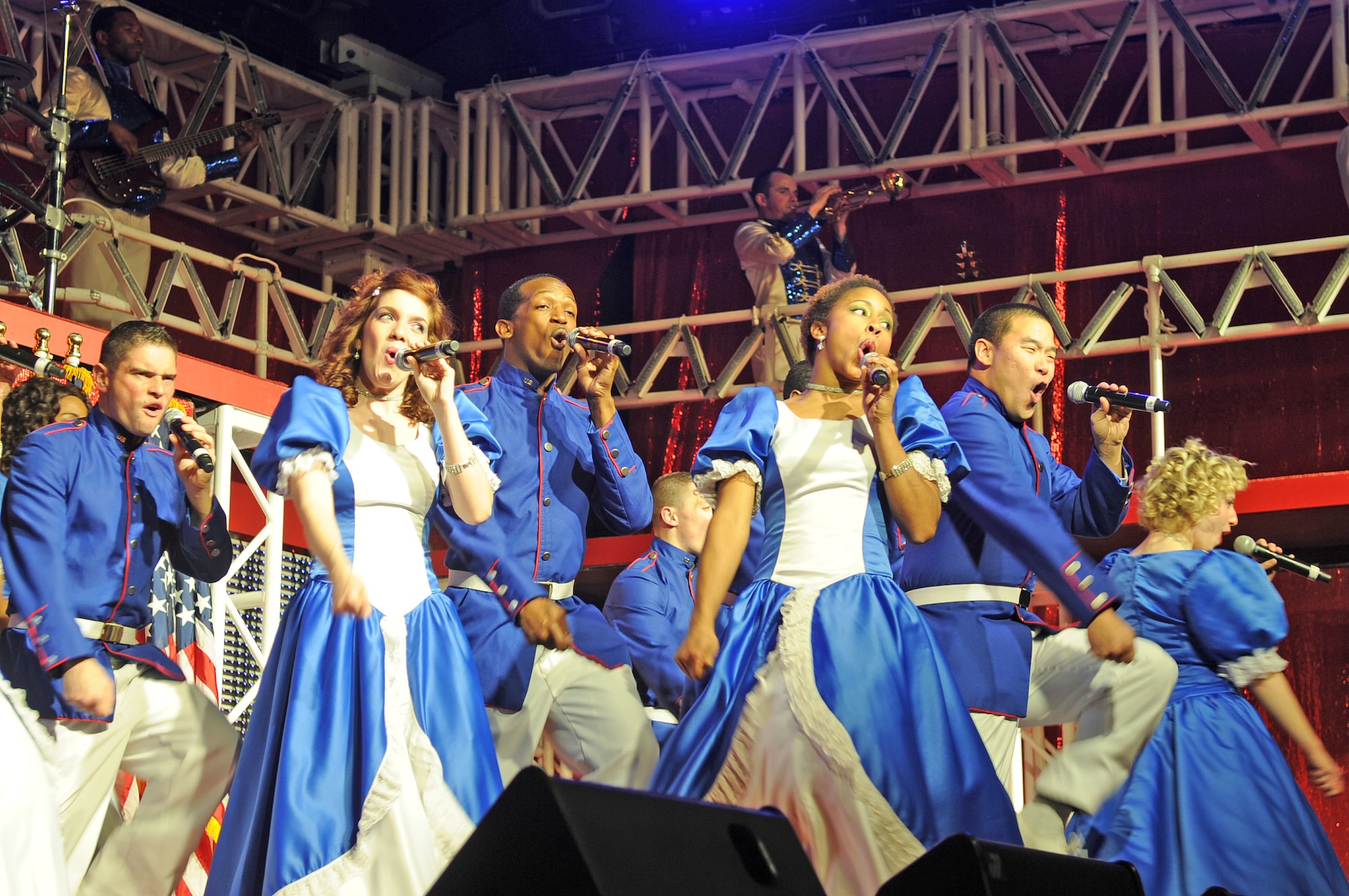Tops in Blue vocalists belt out musical numbers at Seymour Johnson Air Force Base, N.C., Jan. 27, 2012. Tops in Blue performers promote community relations, recruiting and serve as ambassadors for the U.S. Air Force. (U.S. Air Force photo/Senior Airman Gino Reyes;/Released)