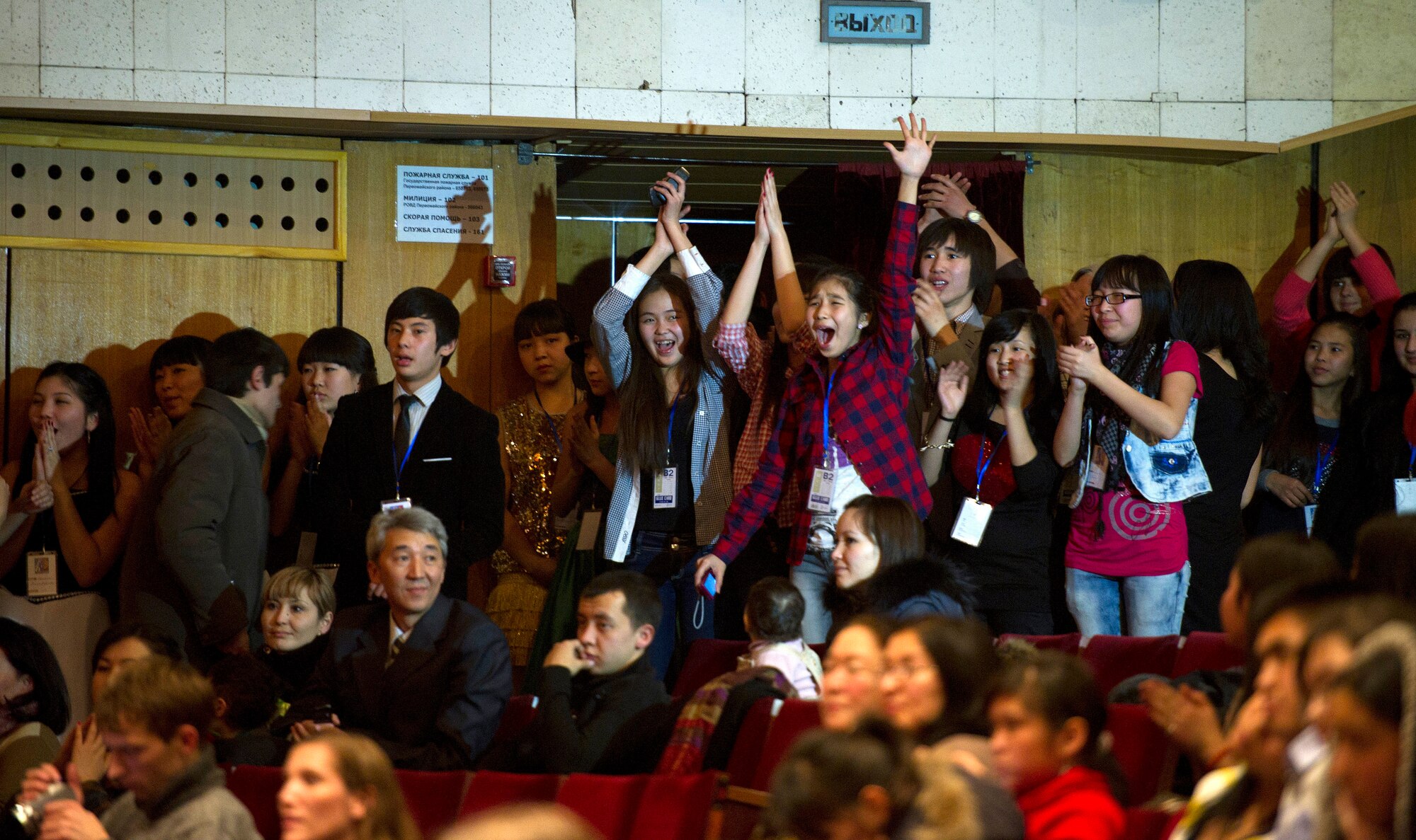 Crowds cheer for contestants during an American song contest at the Seitek Youth Center in Bishkek, Kyrgyzstan, Jan. 31, 2012. Children competed at their respective schools before moving up to the regional level. The American song contest was a celebration sponsored by the U.S. Embassy honoring the 20-year friendship between the U.S. and Kyrgyz Repbulic. (U.S. Air Force photo/Staff Sgt. David Salanitri)