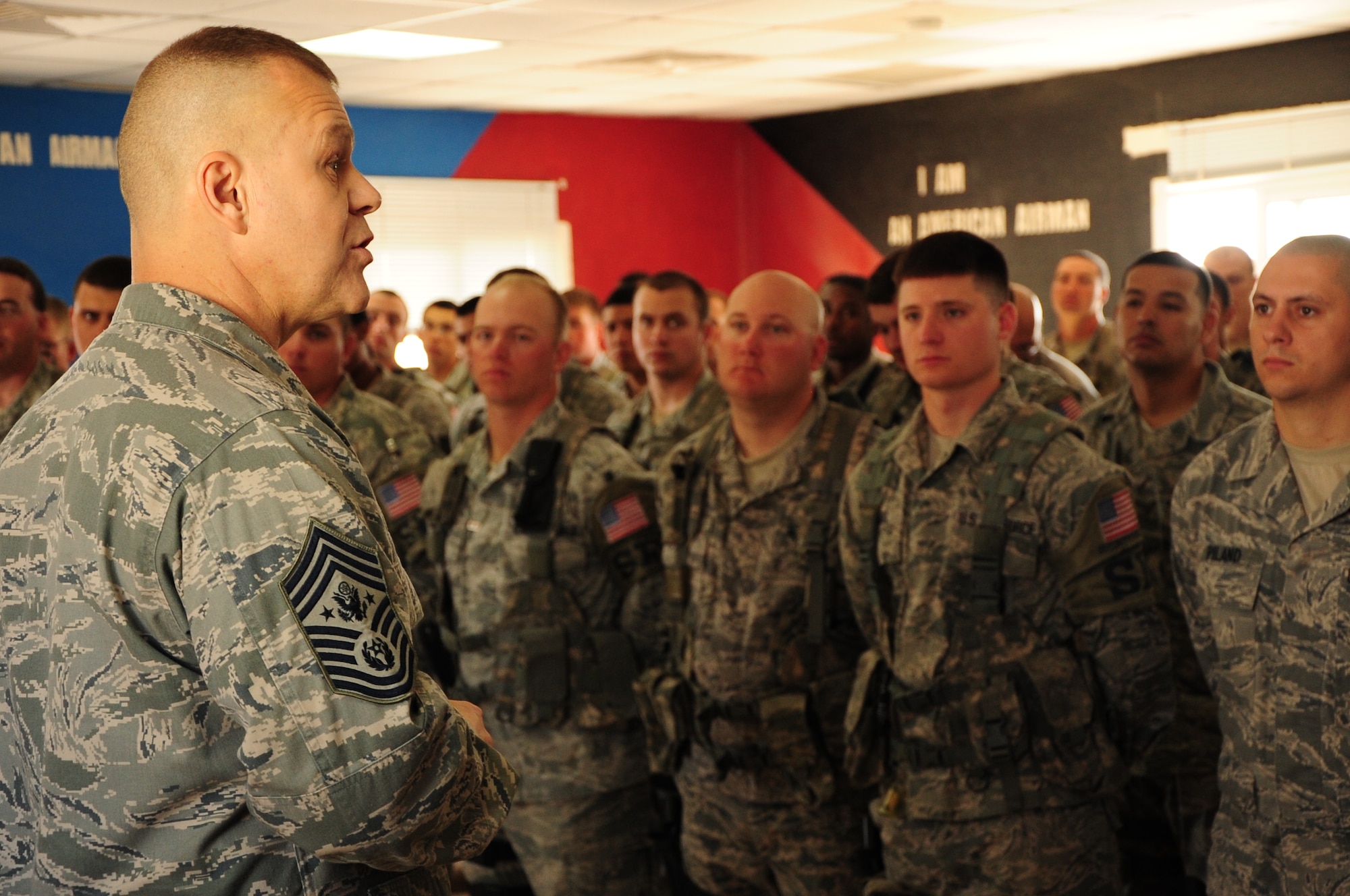 SOUTHWEST ASIA -- Chief Master Sgt. of the Air Force James Roy talks with the Airmen of the 379th Expeditionary Security Forces Squadron during a visit here Jan. 31, 2012. Roy also held an enlisted all-call with deployed Airmen to discuss quality of life issues, resiliency programs, and the future of the Air Force. Roy’s visit to the installation marked the first stop on a tour of Southwest Asia. (U.S. Air Force photo/Senior Airman Michael Charles)