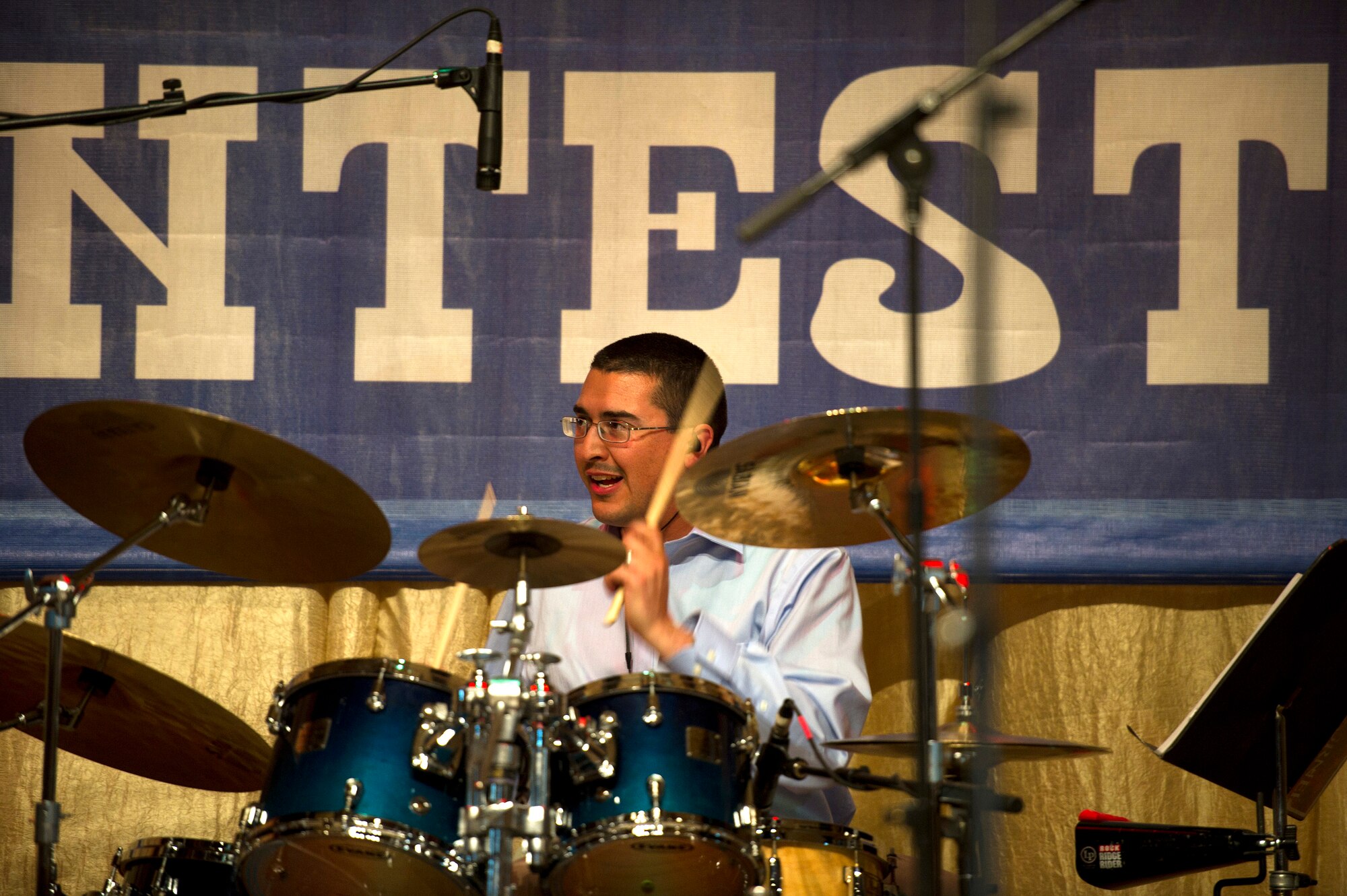 Staff Sgt. Michael Correa, "Afterburner" drummer, plays during a gig at the Seitek Youth Center in Bishkek, Kyrgyzstan, Jan. 31, 2012. The band, a group of United States Air Force members from Hanscom Air Force Base, Mass., had the unique opportunity to perform for Kyrgyz citizens at an American song contest. (U.S. Air Force photo/Staff Sgt. David Salanitri)