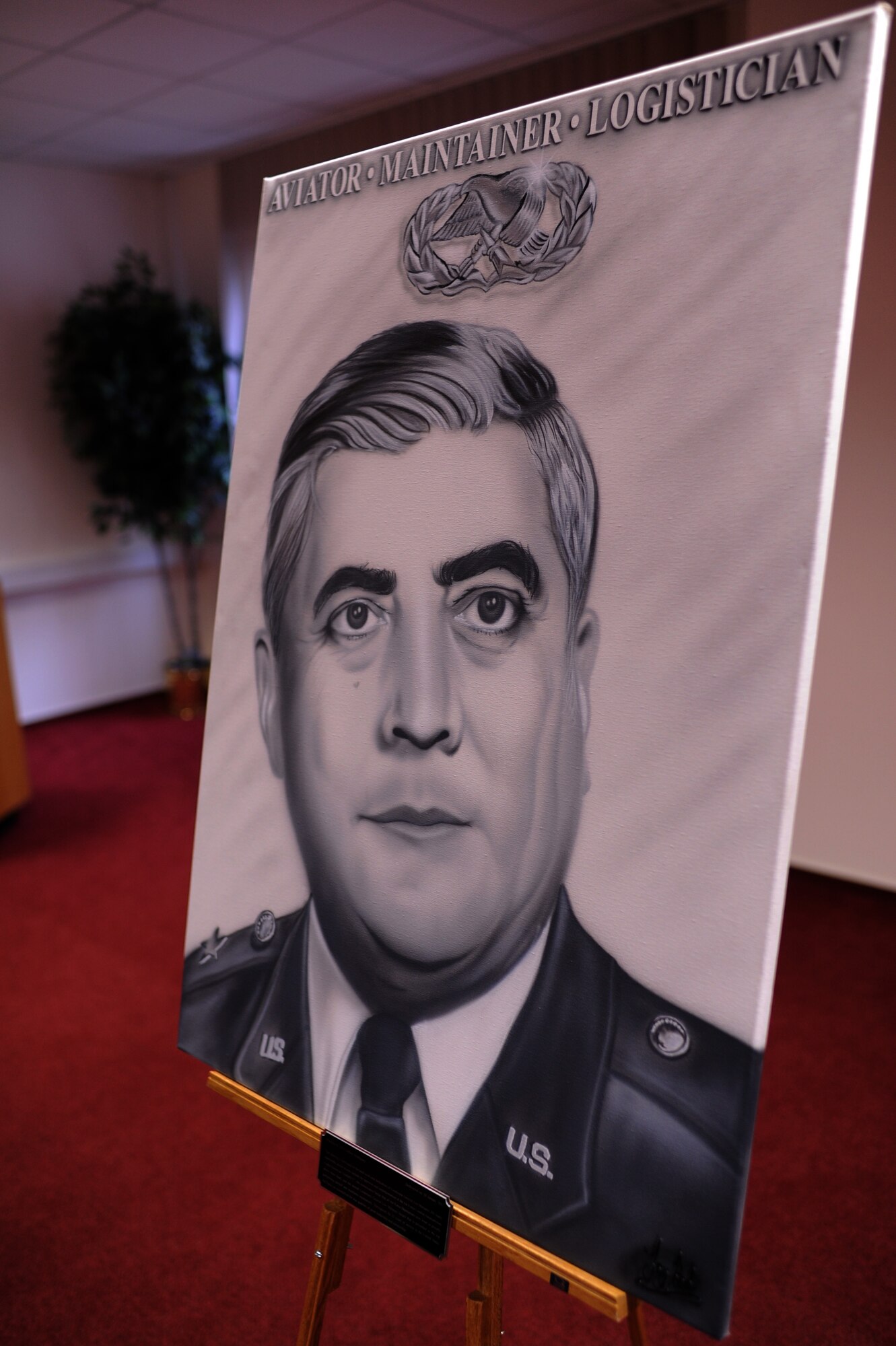 SPANGDAHLEM AIR BASE, Germany – A painting of Lt. Gen. Leo Marquez sits on display during a dedication ceremony in his honor at the Eifel Community Center here Jan. 31. The painting will be displayed at the 52nd Maintenance Group headquarters. Airmen attended the event to honor the achievements and contributions Marquez made to the Air Force in his 33 years of service. Some of Marquez’ additions include the implementation of the Air Force Combat Ammunitions Center — an advanced training course for munitions Airmen — and the maintenance badge that all Air Force maintainers now wear. Marquez died Dec. 30, 2011, at age 79.  (U.S. Air Force photo/Airman 1st Class Matthew B. Fredericks)