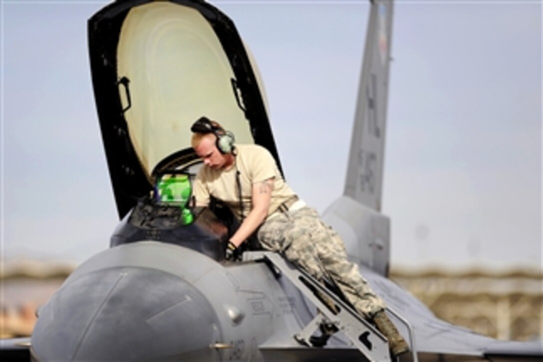 U.S. Air Force Senior Airman Nathan Ritz post-flights a jet after a mission during Red Flag 12-2 at Nellis Air Force Base, Nev., on Jan 26, 2012.  Ritz is an F-16 crew chief assigned to the 388th Fighter Wing.  
