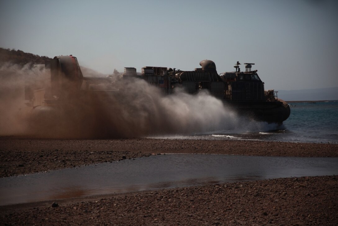 An Assault Craft Unit 5 hovercraft carries vehicles and Marines of the 11th Marine Expeditionary Unit from Djibouti here Feb. 2. The units are deployed as part of the Makin Island Amphibious Ready Group, a U.S. Central Command theater reserve force. The group is providing support for maritime security operations and theater security cooperation efforts in the U.S. Navy's 5th Fleet area of responsibility.