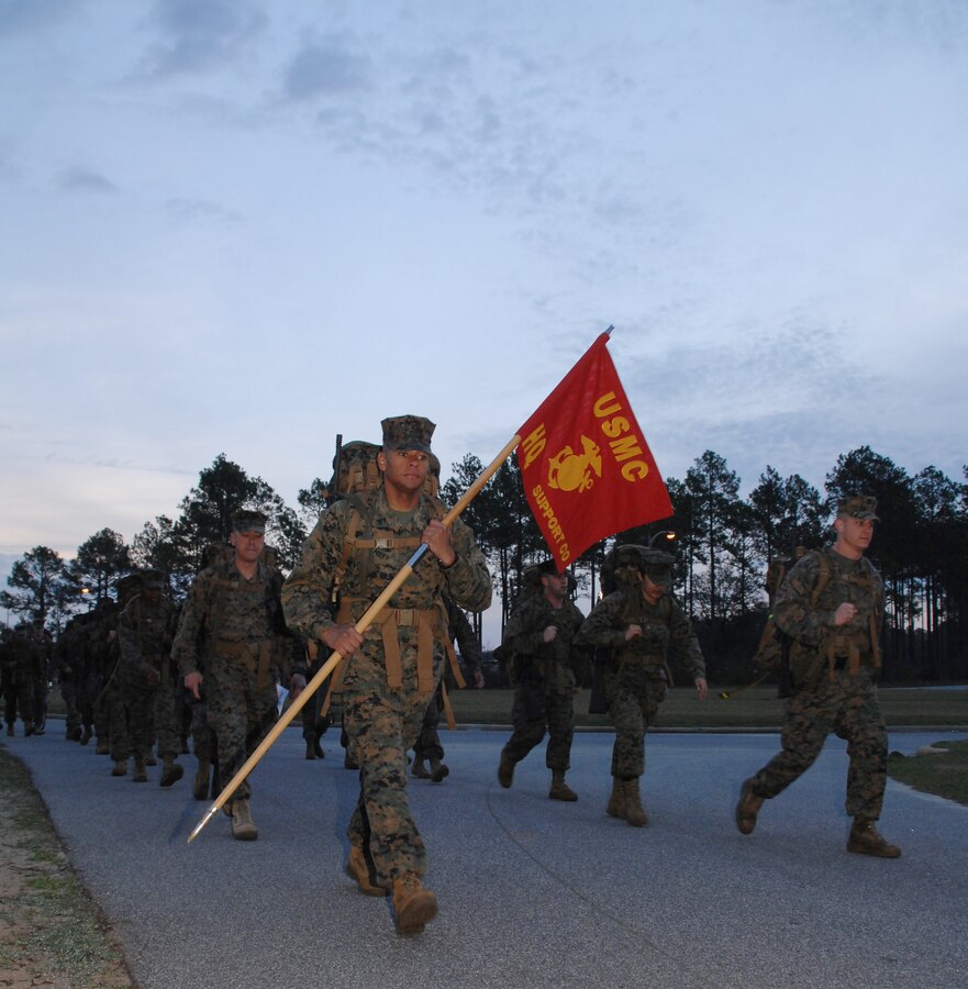 Marines assigned to Headquarters and Support Company, Marine Corps Logistics Base Albany, participate in a 14-mile hike around the base’s perimeter, Feb. 3.