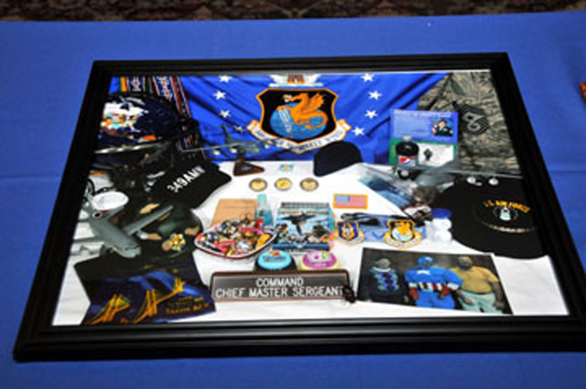 TRAVIS AIR FORCE BASE, Calif. -- Team Travis gave 349th Air Mobility Wing Command Chief Kathleen Buckner a grand send-off Jan. 21. Lt. Gen. Charles E. Stenner, Jr., chose the chief as the new Command Chief Master Sgt. for Air Force Reserve Command Dec. 23, 2011. (U.S. Air Force photo/Master Sgt. Robert Wade)