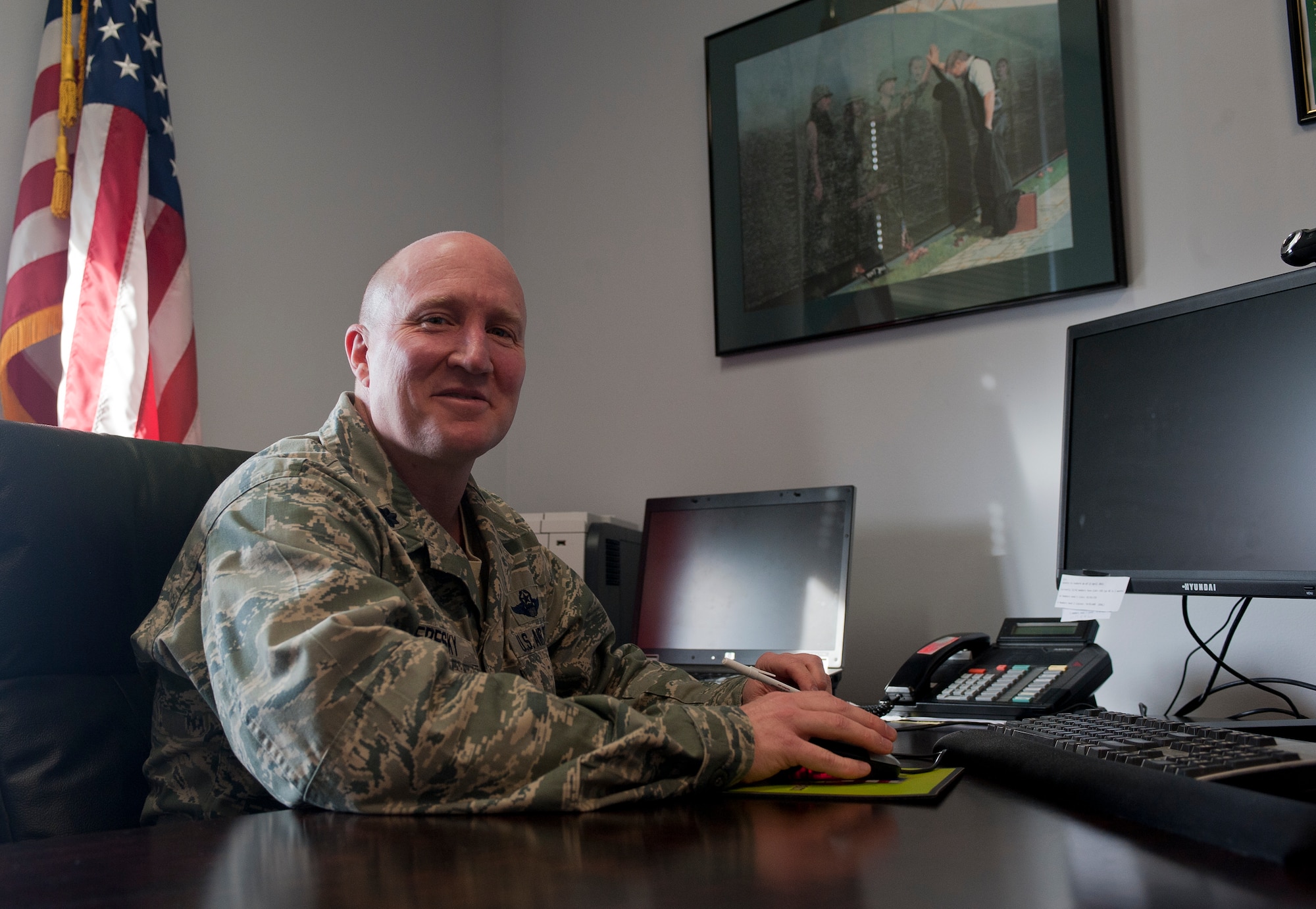 U.S. Air Force Lt. Col. John Deresky, 336th Recruiting Squadron commander, poses at his desk at Moody Air Force Base, Ga., Feb. 3. The 336th RCS processed 1,692 applicants into the Air Force last year making them number one of 24 squadrons in the Air Force. (U.S. Air Force photo by Airman 1st Class Jarrod Grammel/Released)
