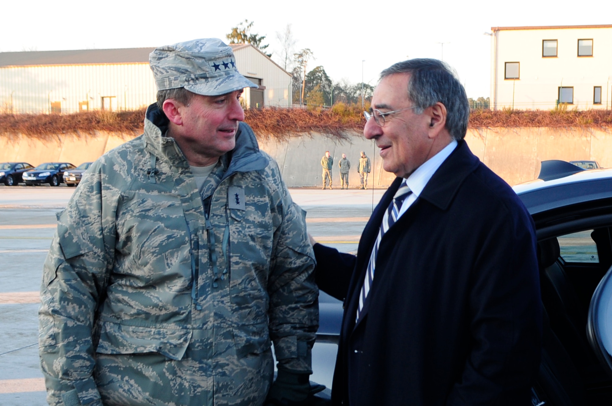 Secretary of Defense Leon Panetta greets Lt. Gen. Stephen P. Mueller on the flightline at Ramstein Air Base, Germany, Feb. 3, 2012. During his visit, the 23rd defense secretary expressed appreciation for the dedication and hard work of the service members who ensure wounded warriors receive world-class care.