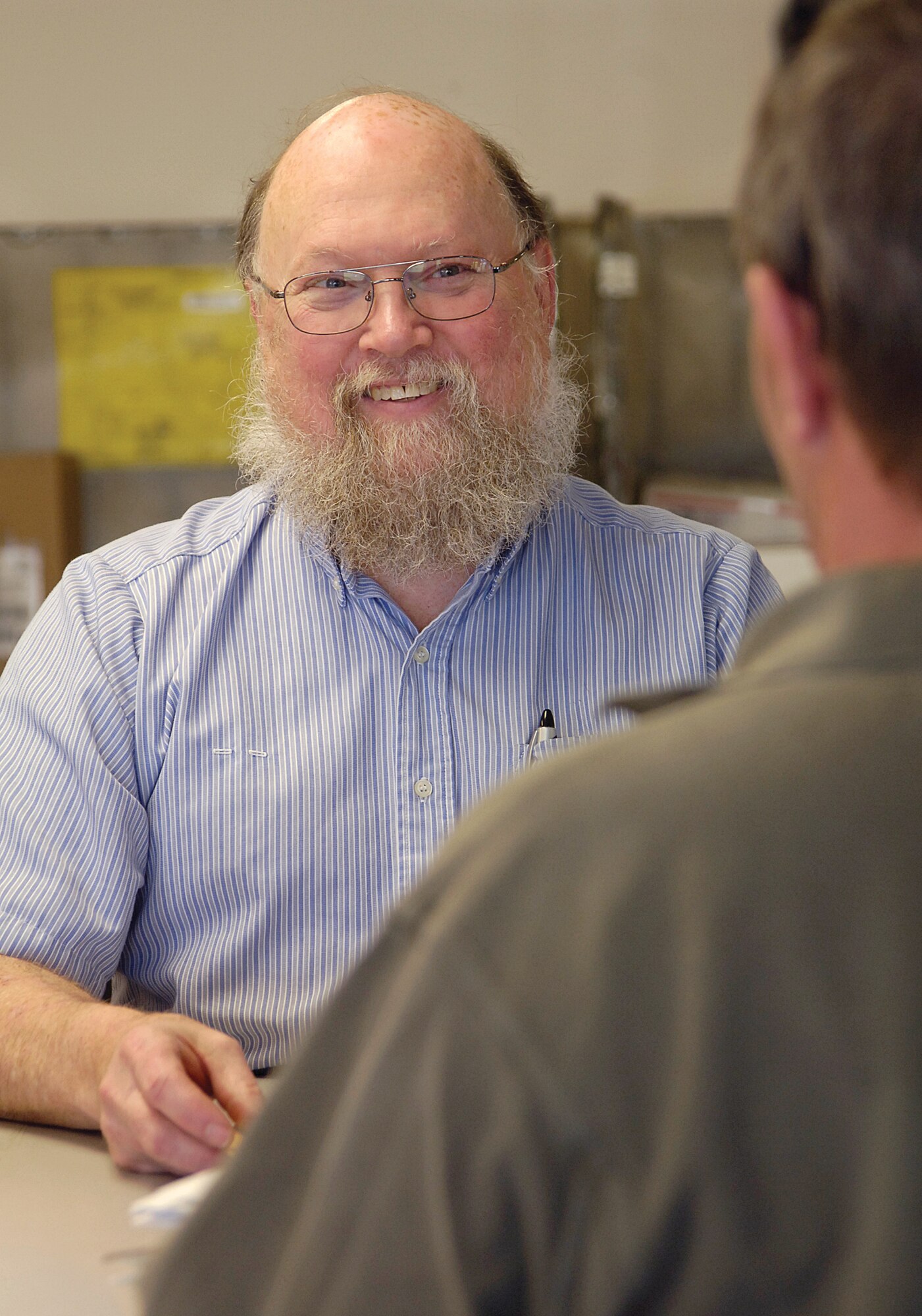 If you’ve mailed anything on base in the last 16 years, Frank Dobry probably helped send your package on its way, single-handedly keeping the mail flowing at the center here located near the base gas station. Mr. Dobry has worked with the U.S. Post Office for more than four decades and came to Tinker in 1994. Through holiday rushes and years on the job, he says he learned patience is the key. The quiet, smiling man behind the counter retired at the end of January, and plans to travel America with his wife and grandson and attend NASCAR races in several states.  As word of his pending retirement spread, customers came with best wishes, hugs, coins, a hand-made mini aircraft chalk coin-holder and a large sheet cake beside his station that he shared with his customers. Asked if he’ll miss the convenience of working in a post office when holiday mail time rolls around this year, he grins and says he’ll miss it but it won’t be a problem, he always mails two weeks ahead of time anyway. (Air Force photo by Margo Wright)