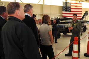 U.S. Air Force Lt. Col. Pete Fesler, 1st Operations Group deputy commander, talks about the F-22 Raptor’s maneuvering superiority during the Air Force Chief of Staff Civic Leader Tour at Langley Air Force Base, Va., Feb. 1, 2012. F-22s host advanced technology enabling pilots to gain a decisive combat edge over other fighter aircraft. (U.S. Air Force photo by Staff Sgt. Jeff Nevison/Released)