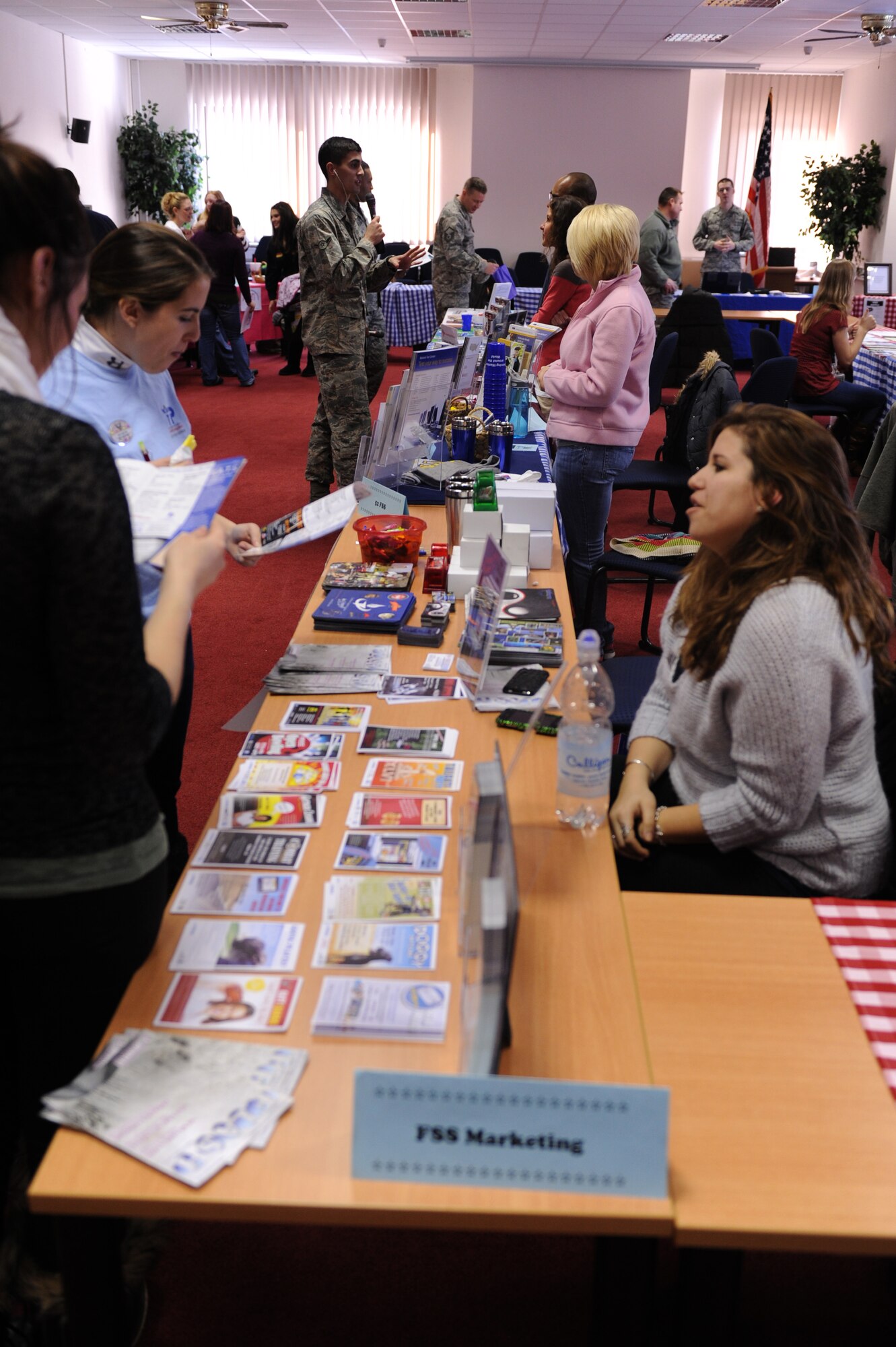 SPANGDAHLEM AIR BASE, Germany – Members from different organizations talk with the Spangdahlem AB community during the “New Year New You” info and job fair at the Eifel Conference Center here Jan 31. More than 20 organizations from on and off base attended the fair sponsored by the 52nd Force Support Squadron Airman and Family Readiness Center and the Volunteer Advisory Committee. The fair was held to help the base populace learn about community activities and get involved with organizations to work toward their New Year’s resolutions. (U.S. Air Force photo/Airman 1st Class Matthew B. Fredericks)