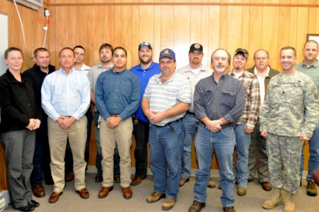 NASHVILLE, Tenn. — Lt. Col. James A. DeLapp (right), U.S. Army Corps of Engineers Nashville District commander, poses for the class photo during his visit to confer diplomas on graduates of the district's last lock operator class at J. Percy Priest Lake here, Jan. 31, 2012.