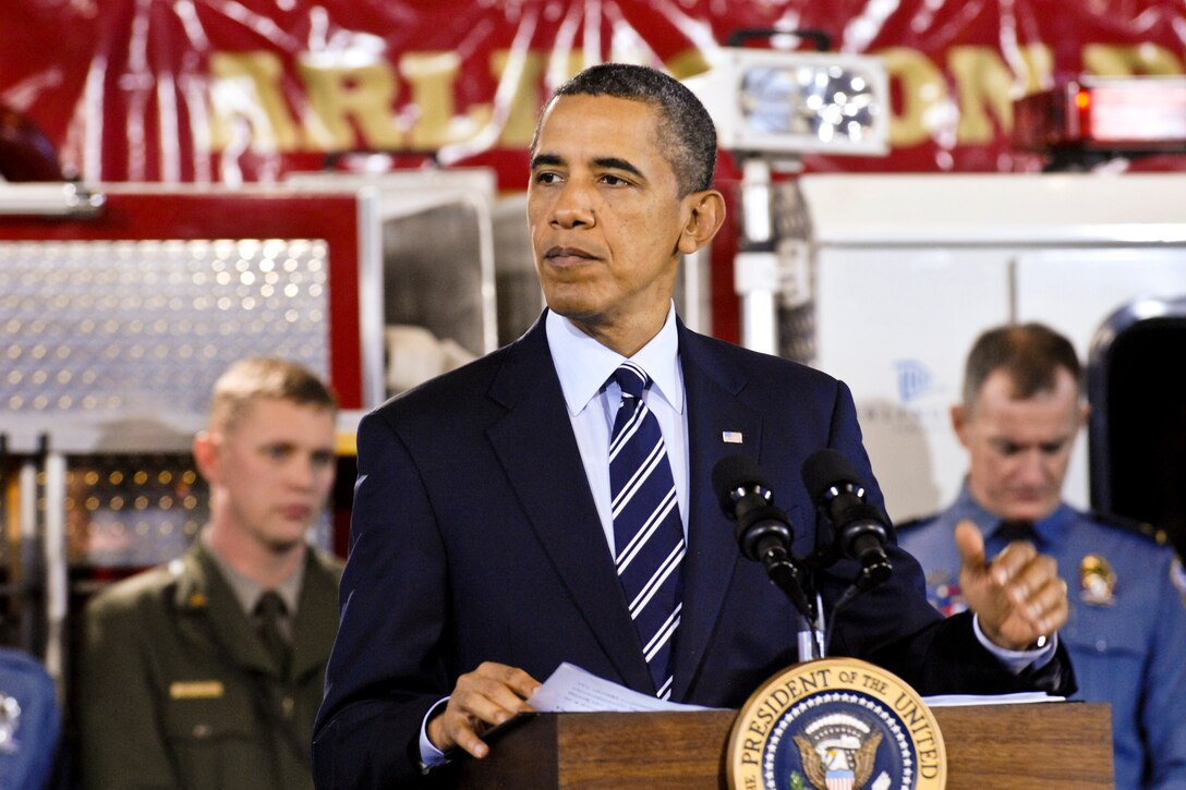 President Barack Obama, flanked by firefighters, national park employees and police men and women, talks about his new Veteran Job Corps initiative to replenish the nation’s first responders at Fire Station #5 in Arlington, Va., Feb 3, 2012. Obama chose Fire Station #5 because its firefighters were among the first responders to first arrive at the Pentagon on following the Sept. 11 attacks. DOD photo by Sgt. 1st Class Tyrone C. Marshall Jr.