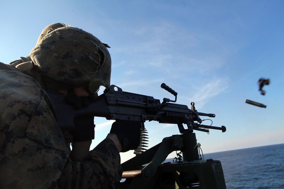 Marines with the 24th Marine Expeditionary Unit fire an M-240B machine gun at a Killer Tomato, a target used for shooting at sea, from the ship’s flight deck, Feb. 3. Marines and Sailors with Combat Logistics Battalion 24, 24th MEU, and Charlie Company, Battalion Landing Team 1st Battalion, 2nd Marine Regiment, 24th MEU, spent the day firing M-240B medium machine guns and M-249 squad automatic weapons off the back of Internally Transportable Vehicles. The training took place during the 24th MEU’s Certification Exercise (CERTEX) with Amphibious Squadron 8 (PHIBRON 8) scheduled Jan. 27 to Feb. 17, which includes a series of missions intended to evaluate and certify the unit for their upcoming deployment.