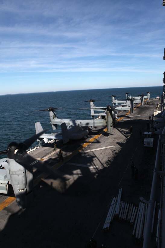 MV-22 Ospreys, with Marine Medium Tiltrotor Squadron 263, 22nd Marine Expeditionary Unit, launch off the flight deck of USS Bataan on their way back to Marine Corps Air Station New River, N.C., Feb. 3, 2012. The Marines and sailors of the 22nd MEU are in there final days of their 10-month deployment with Amphibious Squadron 6 aboard the USS Bataan Amphibious Ready Group.  The 22nd MEU is a multi-mission, capable force, comprised of an Aviation Combat Element, Marine Medium Tilt Rotor Squadron 263 (Reinforced); a Logistics Combat Element, Combat Logistics Battalion 22; a Ground Combat Element, Battalion Landing Team, 2nd Battalion, 2nd Marine Regiment; and its Command Element.
