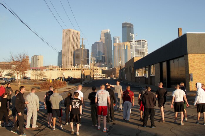 Recruiters line up outside CrossFit Minneapolis Feb. 4 to conduct a modified Helen workout. The exercise consisted of three 400 meter runs, 63 kettlebell swings and 30 10-count body builders. Sgt. Adam J. Kruse, a recruiter out of the Woodbury, Minn., office who completed the workout with the fastest time, finished in 9:33. More than a dozen recruiters attended the three-day CrossFit training seminar to enhance fitness levels within the Delayed Entry Program. For additional imagery from the event, visit www.facebook.com/rstwincities.