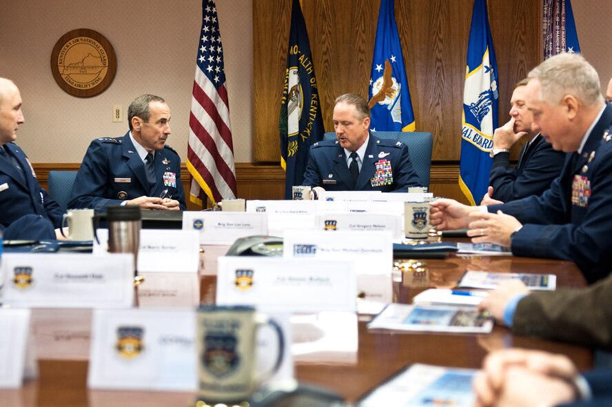 Gen. Raymond Johns (left), commander of Air Mobility Command, listens to a briefing on the 123rd Airlift Wing Initial Response Hub concept from Col. Greg Nelson, wing commander, during a tour of the Kentucky Air Guard Base in Louisville, Ky., Dec. 19, 2011. Under the concept, the wing would deploy all the assets necessary to establish an airlift hub at a remote location within hours of a natural disaster or enemy attack, enabling relief supplies to flow in and medical evacuees to flow out. The 123rd Airlift Wing is the only unit in the U.S. military with all the necessary capabilities, housed in a single location, and the aircraft to transport them on short notice. (U.S. Air Force photo by Master Sgt. Phil Speck)