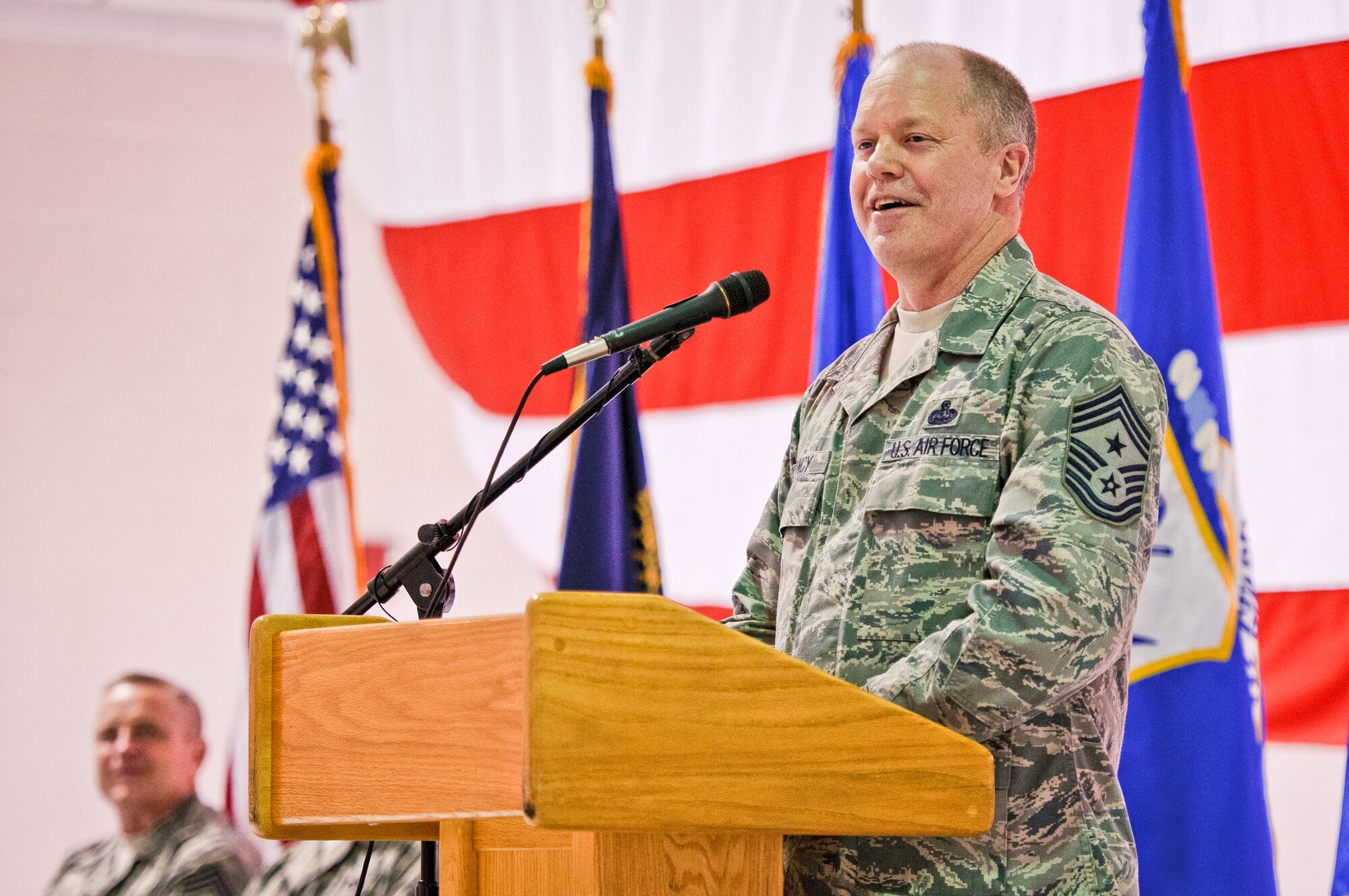Chief Master Sgt. Christopher Muncy, command chief master sergeant of the Air National Guard, speaks to enlisted members of the Kentucky Air National Guard during a town hall meeting at the 123rd Airlift Wing in Louisville, Ky., on Nov. 20, 2011. Muncy was in Louisville to take part in a ceremony honoring three Kentucky Air Guardsmen who earned Bronze Star medals for their achievements as Explosive Ordnance Disposal technicians in Afghanistan. (U.S. Air Force photo by Senior Airman Maxwell Rechel)