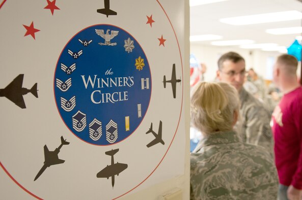 Airmen from the from the 123rd Airlift Wing attend the reopening of the Kentucky Air National Guard's Morale, Welfare and Recreation facility in Louisville, Ky., on Jan. 7, 2012. The facility, known as The Winner's Circle, features pool and foosball tables, a kitchen and a volleyball court. It is operated by the 123rd Force Support Squadron. (U.S. Air Force photo by Senior Airman Maxwell Rechel)