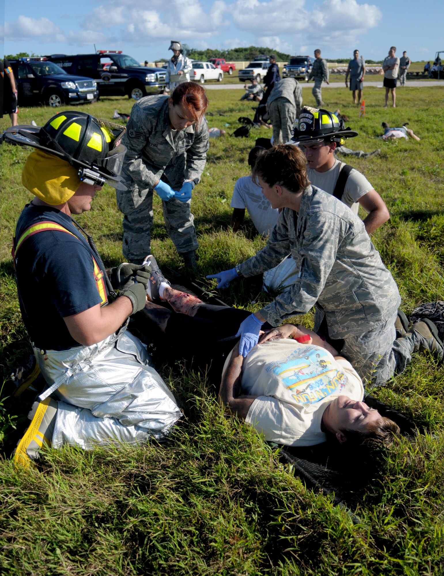 Participating Airmen and emergency response personnel respond to a simulated C-17 crash near the runway during a joint exercise Jan. 30. The exercise was unique because not only did Airmen carry out emergency response procedures, they also completed the initial steps for recovery and, for the first time, provided the necessary products to initiate a safety investigation board. (U.S. Air Force photo/Senior Airman Jeffrey Schultze) 

