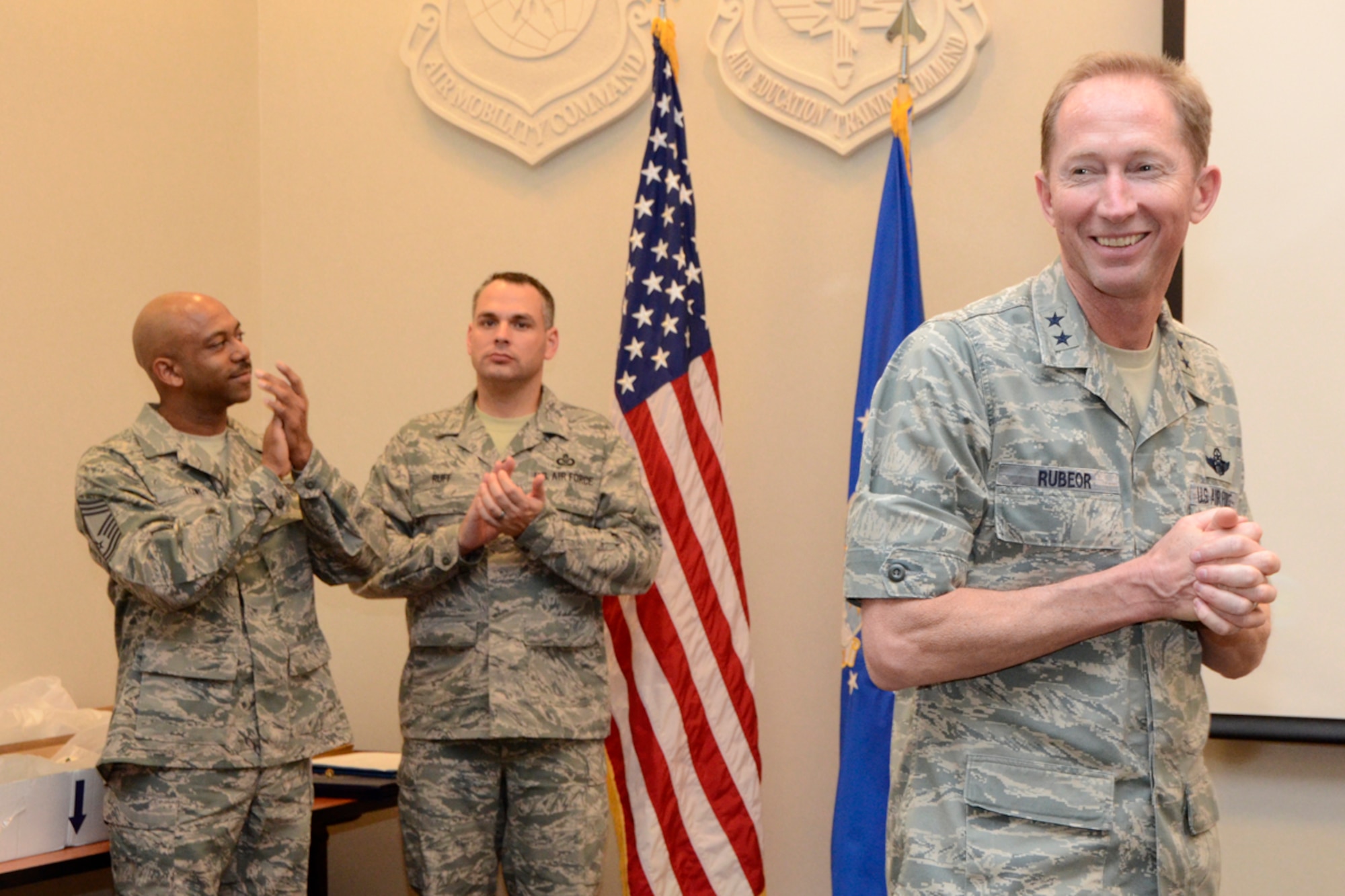 Maj. Gen. James T. Rubeor, special assistant to the commander, North American Aerospace Defense Command and United States Northern Command for Reserve Matters, Headquarters United States Northern Command, Peterson Air Force Base, Colo., officiates a retirement ceremony honoring Master Sgt. Rosalyn L. Williams, 22nd Air Force Tasker Division superintendant, after 30 years of service to the U.S. Air Force and Air Force Reserve. (U.S. Air Force photo/Master Sgt. James Branch)