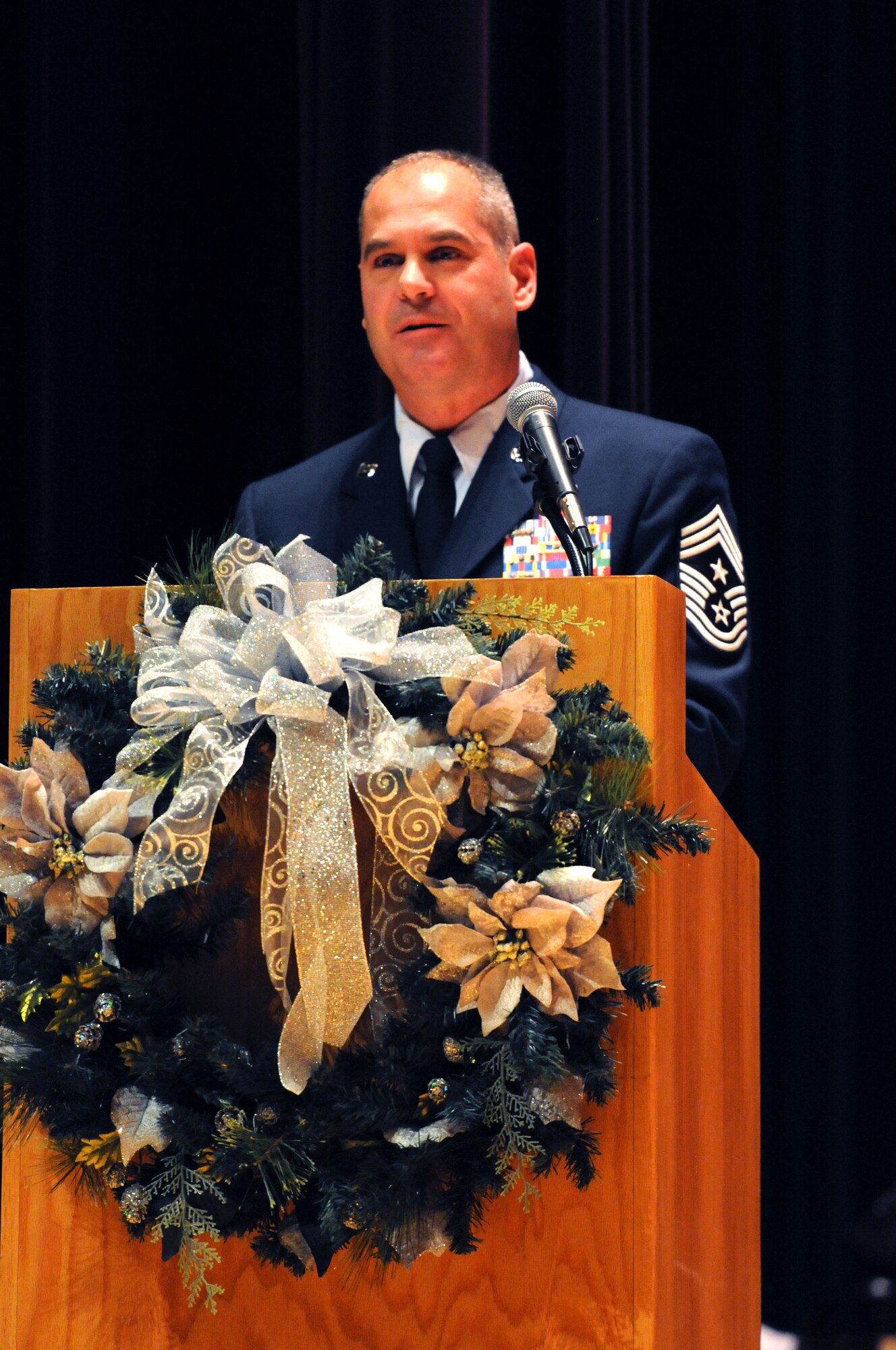 148th Fighter Wing Command Chief Master Sgt. Mark Rukavina addresses the 148th Fighter Wing for the first time as command chief during the Transfer of Authority ceremony December 4, 2012 at the Duluth Entertainment Convention Center.  (National Guard photo by Tech. Sgt. Brett Ewald.)