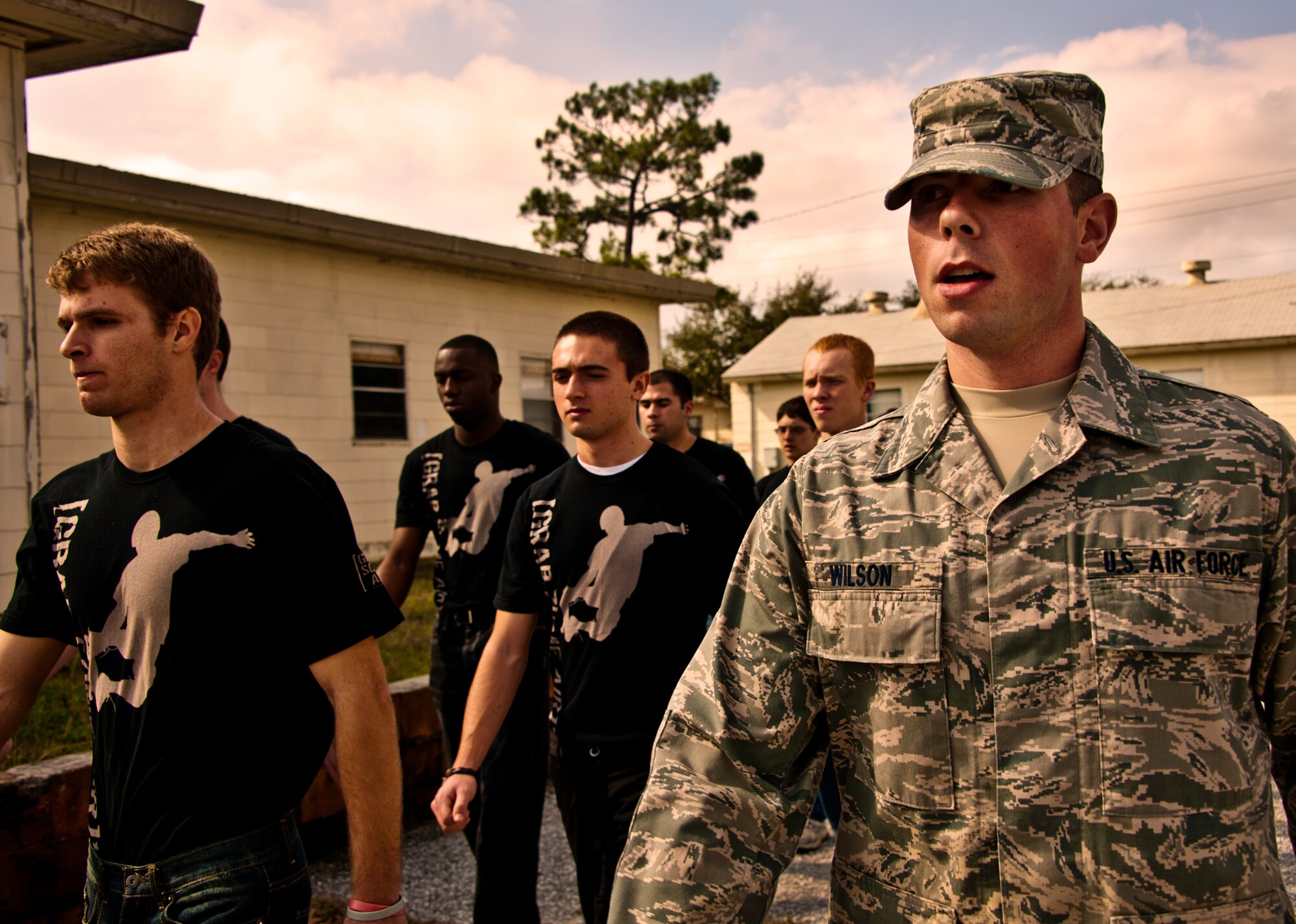 Airman 1st Class John Wilson, of the 919th Special Operations Wing, calls cadence for new Air Force Reserve recruits, who are learning to march at Duke Field, Fla., Feb. 5.  This six-month-old introductory training is a new Air Force Reserve Command program to help recruits prepare for military life prior to going to basic military training.  (U.S. Air Force photo/Tech. Sgt. Samuel King Jr.)