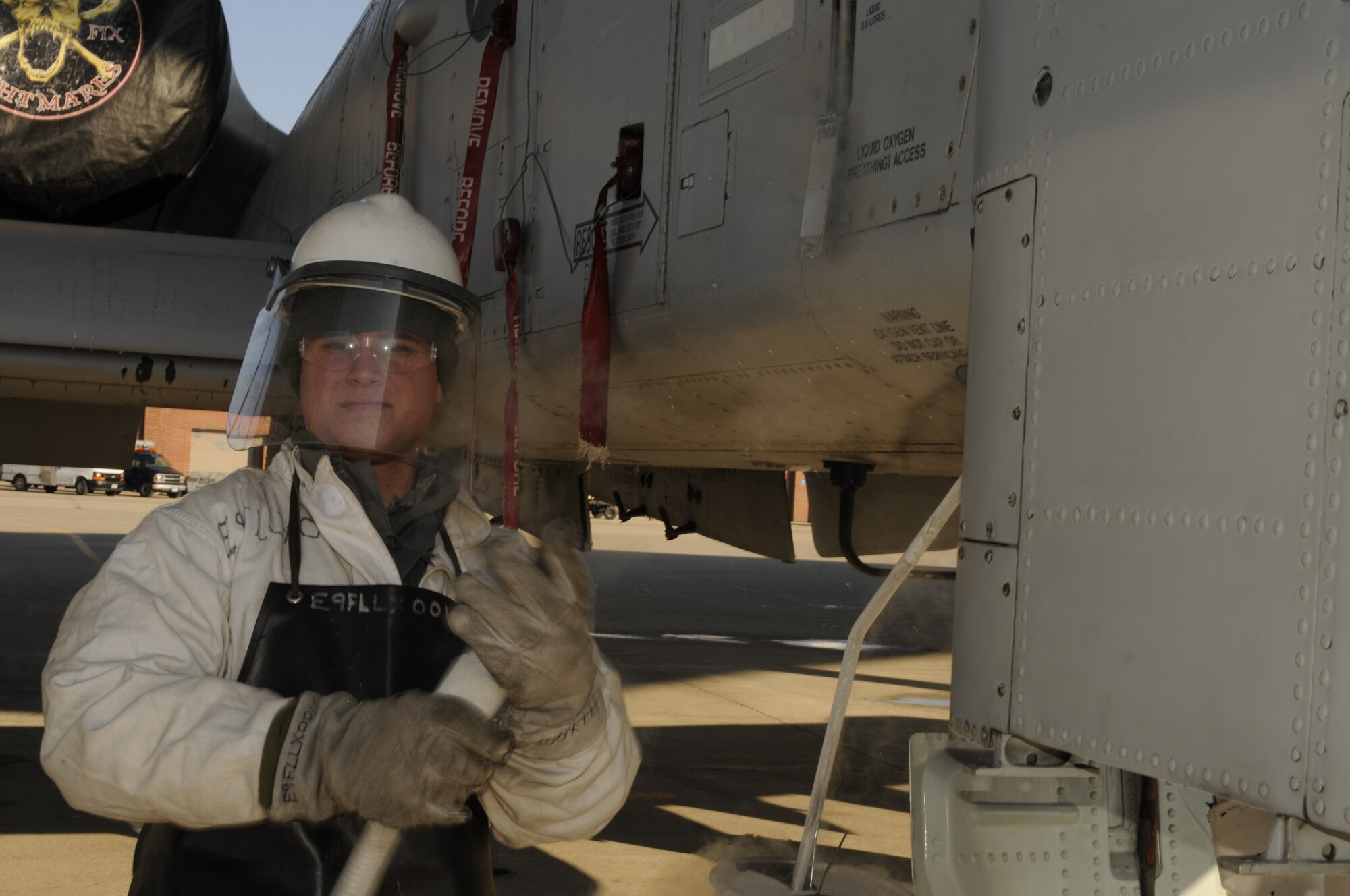 Airman 1st Class Zak Skelton prepares to connect a liquid oxygen transfer hose to an A-10 Thunderbolt II aircraft Feb. 5, 2012, during a LOX servicing procedure at Selfridge Air National Guard Base, Mich. Skelton is a crew chief with the 127th Aircraft Maintenance Squadron, a component of the Michigan Air National Guard. (U.S. Air Force photo by TSgt. David Kujawa)