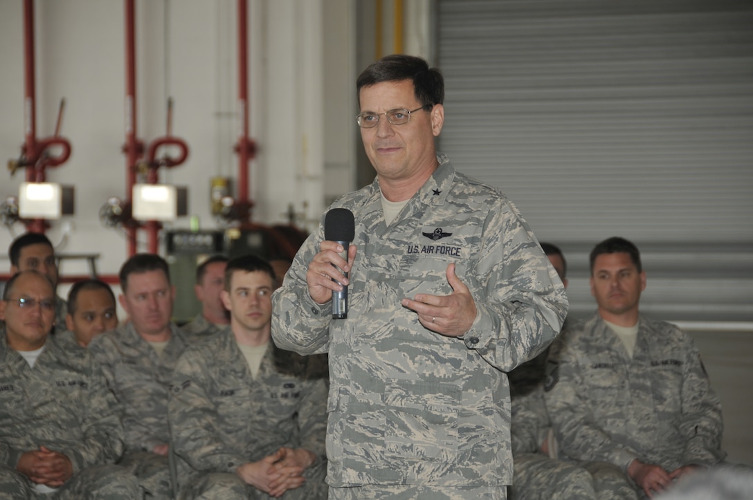 Brig. Gen. James C. Witham, commander of the California Air National Guard, conducts a town hall meeting with 129th Rescue Wing Airmen at Moffett Federal Airfield, Calif., Feb. 4, 2012. This is Witham’s first visit to the 129th since becoming the CA ANG commander and it gave Airmen an opportunity to ask questions about the future of the Guard. (Air National Guard photo by Staff Sgt. Kim E. Ramirez)