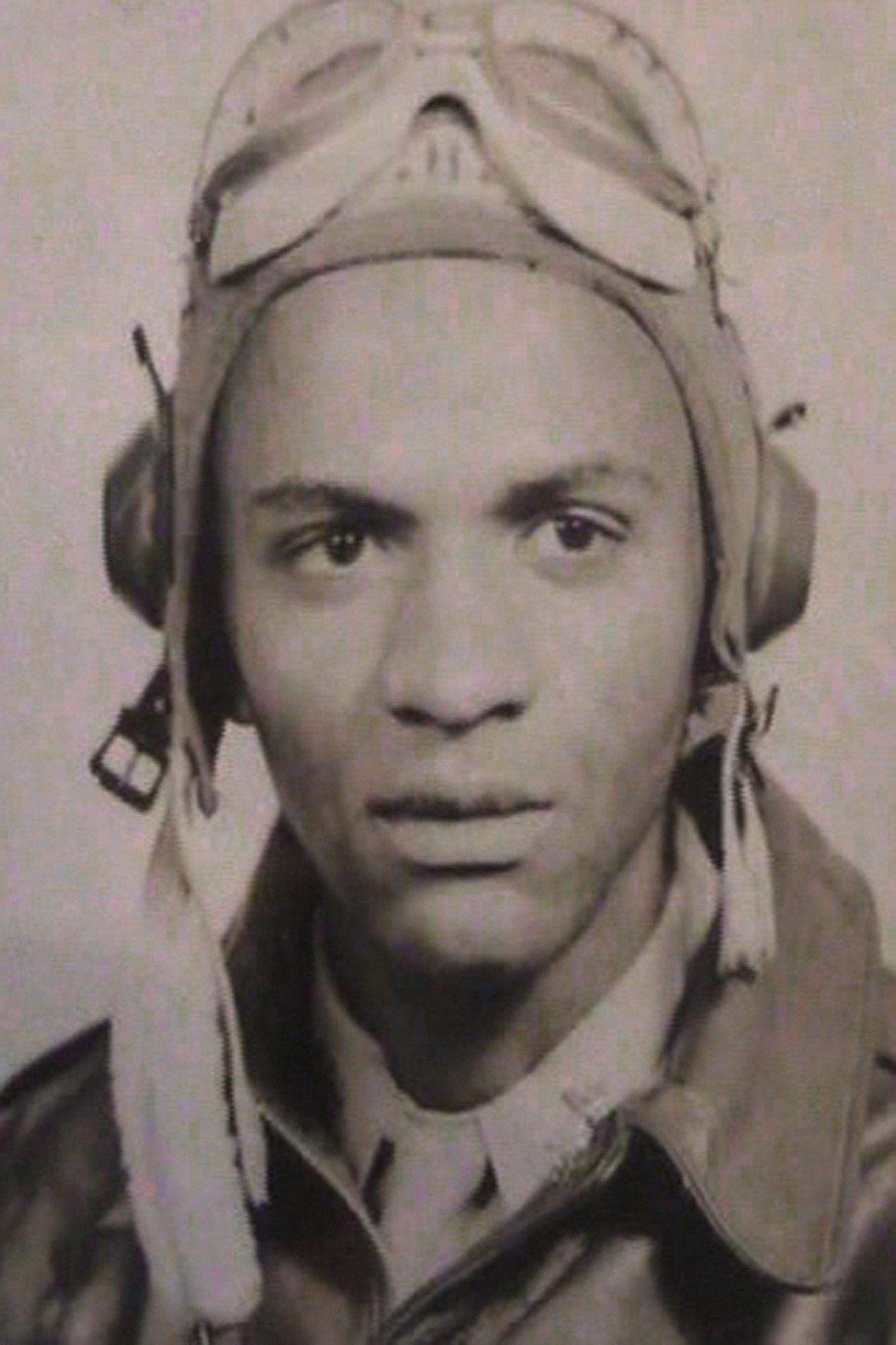Tuskegee Airman James Bowman poses for a photograph on the occasion of his graduation from the Tuskegee Institute, Tuskegee, Alabama in January, 1945.  Photo courtesy of the Iowa Gold Star Military Museum, Camp Dodge, Iowa.  (US Army Air Corps photo/Unknown)(Released)