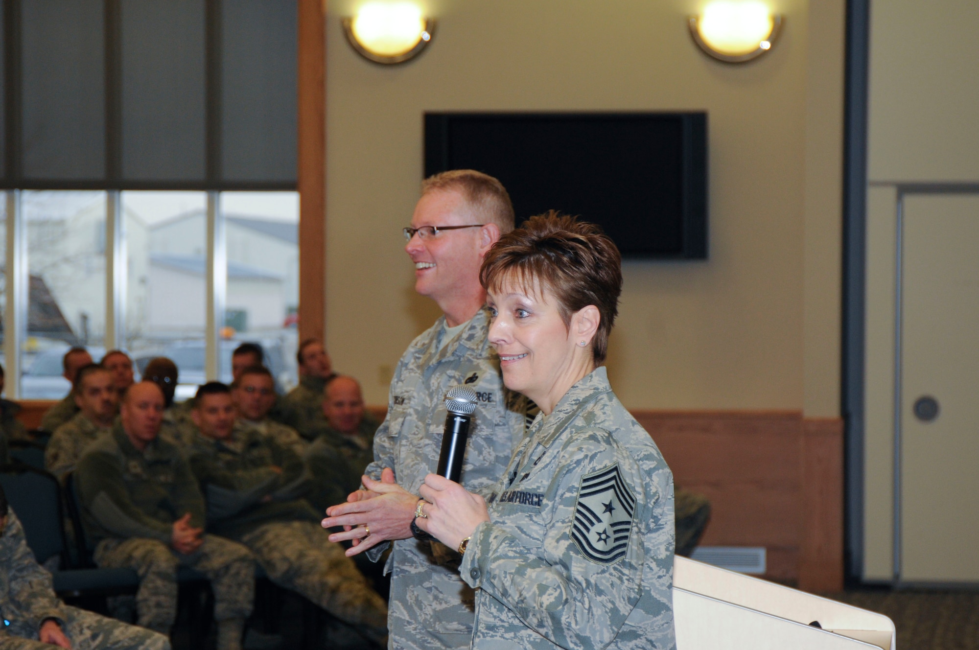 CMSgt. Denise Jelinski-Hall, senior enlisted leader of the National Guard Bureau, is joined by CMSgt. Robert Dobson, command chief of the 127th Wing, during a town hall meeting Feb. 4, 2012, at Selfridge Air National Guard Base, Mich. Jelinski-Hall visited Selfridge part of a tour of several Michigan National Guard facilities. At each stop, she spoke to Airmen and Soldiers and sought their input on issues to take back to the senior leaders of the Guard. (U.S. Air Force photo by TSgt. David Kujawa)