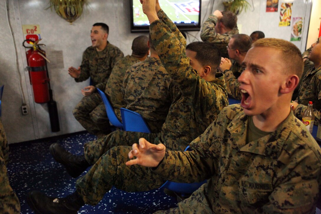 Pfc. Nathanael Eichorn, a squad automatic weapon gunner with Charlie Company, Battalion Landing Team 1st Battalion, 2nd Marine Regiment, 24th Marine Expeditionary Unit, grimaces in the ship’s chow hall while watching the Super Bowl, as the New England Patriots drop the ball during the last 50 seconds of the game, Feb. 5. Marines and Sailors aboard the USS Gunston Hall crammed into office spaces, lounge areas, gyms, the chow hall and anywhere else with a television to watch the Super Bowl while at sea. The 24th MEU is conducting their Certification Exercise (CERTEX) with Iwo Jima Amphibious Ready Group, scheduled Jan. 27 to Feb. 17, which includes a series of missions intended to evaluate and certify the unit for their upcoming deployment.