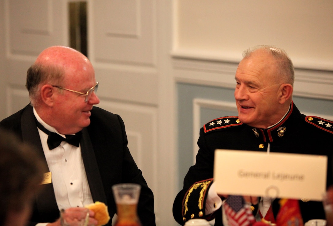Dave Earley, president of the second Marine division association speaks to Lt. Gen. Dennis Hejlik, Commander of Marine Corps Forces Command, during the 2nd Marine Division birthday banquet held aboard Marine Corps Base Camp Lejeune, N.C., Feb. 3. During the banquet Hejlik spoke on the division’s history as well as its current strides for the continued success of 2nd Marine Division.