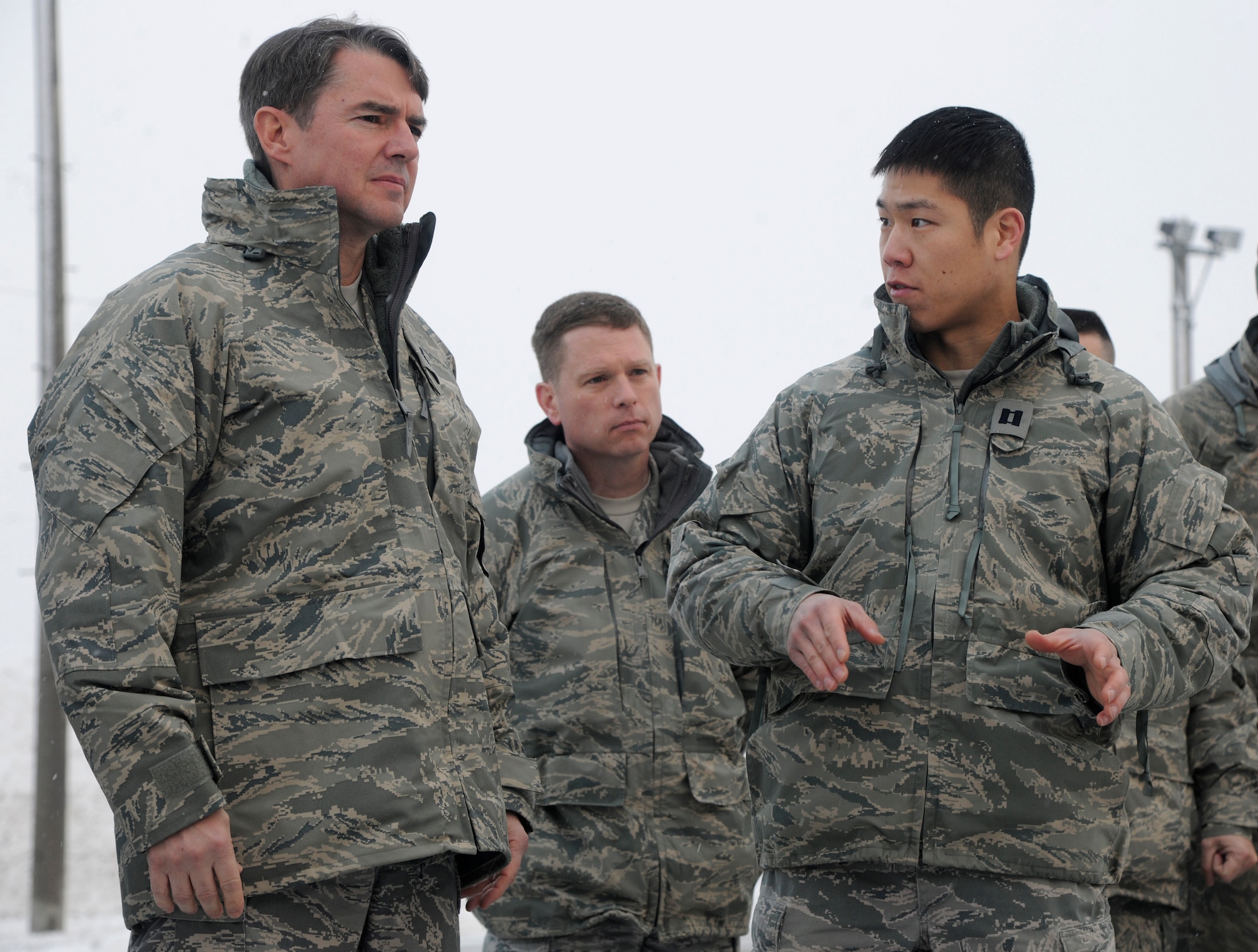 Lt. Gen. Jan-Marc Jouas, 7th Air Force commander, listens as Capt. Hoyoon Chung, 8th Maintenance Squadron munitions flight commander, explains unit related issues and capabilities he and his folks have at Kunsan Air Base, Republic of Korea, Jan. 27, 2012. It was his first visit to the Wolf Pack since assuming command of the 7th AF. (U.S. Air Force photo by Staff Sgt. Rasheen A. Douglas/Released)