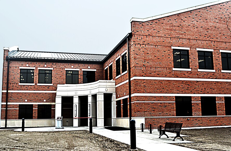 The front entrance to the new $7.4 million, 21,500 sq. ft. building which houses the 375th Aeromedical Evacuation Squadron just moments before the Feb. 6, 2012 ceremonial ribbon cutting at Scott Air Force Base, Ill.  This building represents where the Air Force is going in new construction—LEED certification, which stands for Leadership, Energy and Environmental Design—which provides a framework for designers to work toward sustainable buildings. For Scott AFB, that means energy efficiency, being better to the environment and saving money in operational costs.  The Air Force designs its buildings toward a “silver” certification award,  and Scott AFB hopes to earn a “Gold” LEED certification. (U.S. Air Force photo/Karen Petitt)