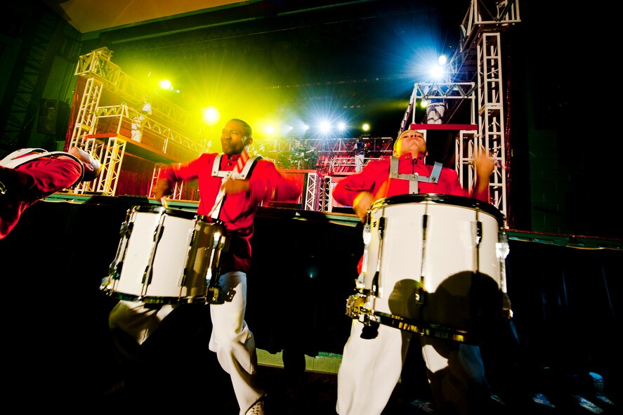 Tops in Blue members play the drums during a performance at the Mathis Auditorium, Valdosta, Ga., Feb. 2, 2012. The show was open to all members of the Valdosta and Moody Air Force Base community. (U.S. Air Force photo by Staff Sgt. Jamal D. Sutter/Released) 