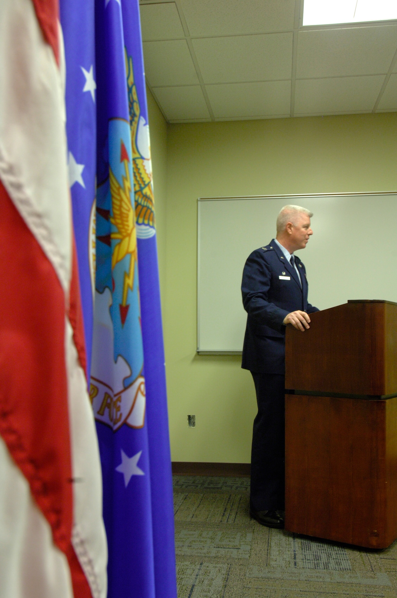 Col. Edward Farley, 375th Aeromedical Evacuation Squadron commander, briefs senor leaders and congressionals about the new 21,500 sq. ft. AE building, which will house 163 active duty, Guard and Reserve personnel who bring home home the wounded from the battlefields during a ribbon cutting ceremony at Scott Air Force Base, Ill., Feb. 6, 2012.  The facility houses a Mediman Training Simulator, provides direct access to the flightline and has enough room for the safe storage of medicine and equipment. (U.S. Air Force photo/Airman 1st Class Jake Eckhardt)  