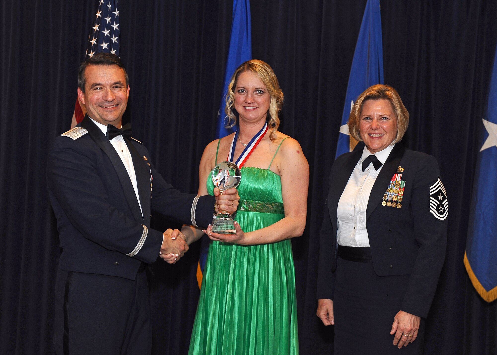 Karen Singer, 55th Medical Support Squadron, was named Junior Civilian of the Year during the 55th Wing Annual Awards Banquet at Offutt Air Force Base's Patriot Club Feb. 3.  (U.S. Air Force Photo by Josh Plueger/Released)