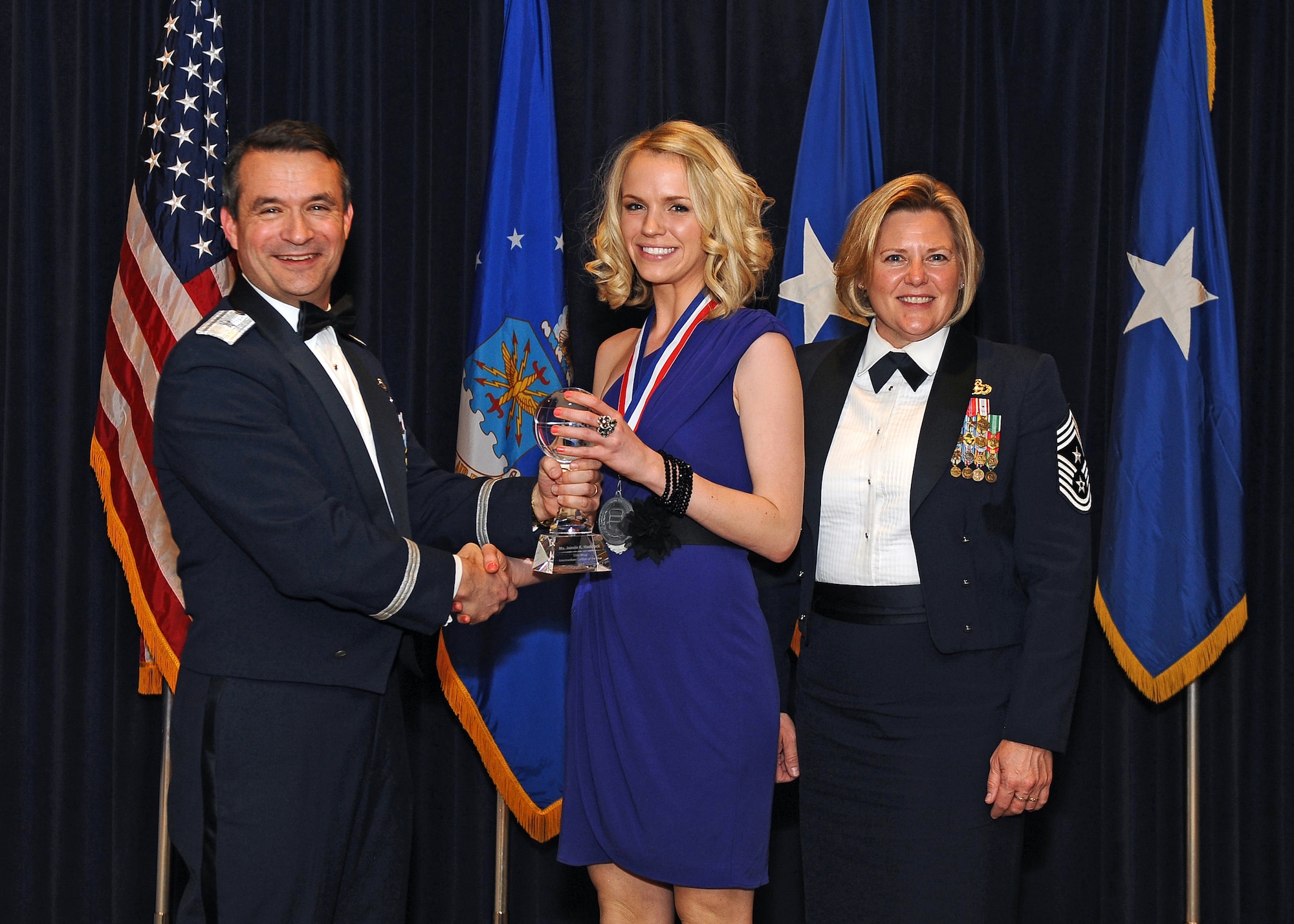 Jaimie Haddock, 55th Contracting Squadron, earned the Intermediate Civilian of the Year during the 55th Wing Annual Awards Banquet at Offutt Air Force Base's Patriot Club Feb. 3.  (U.S. Air Force Photo by Josh Plueger/Released)

