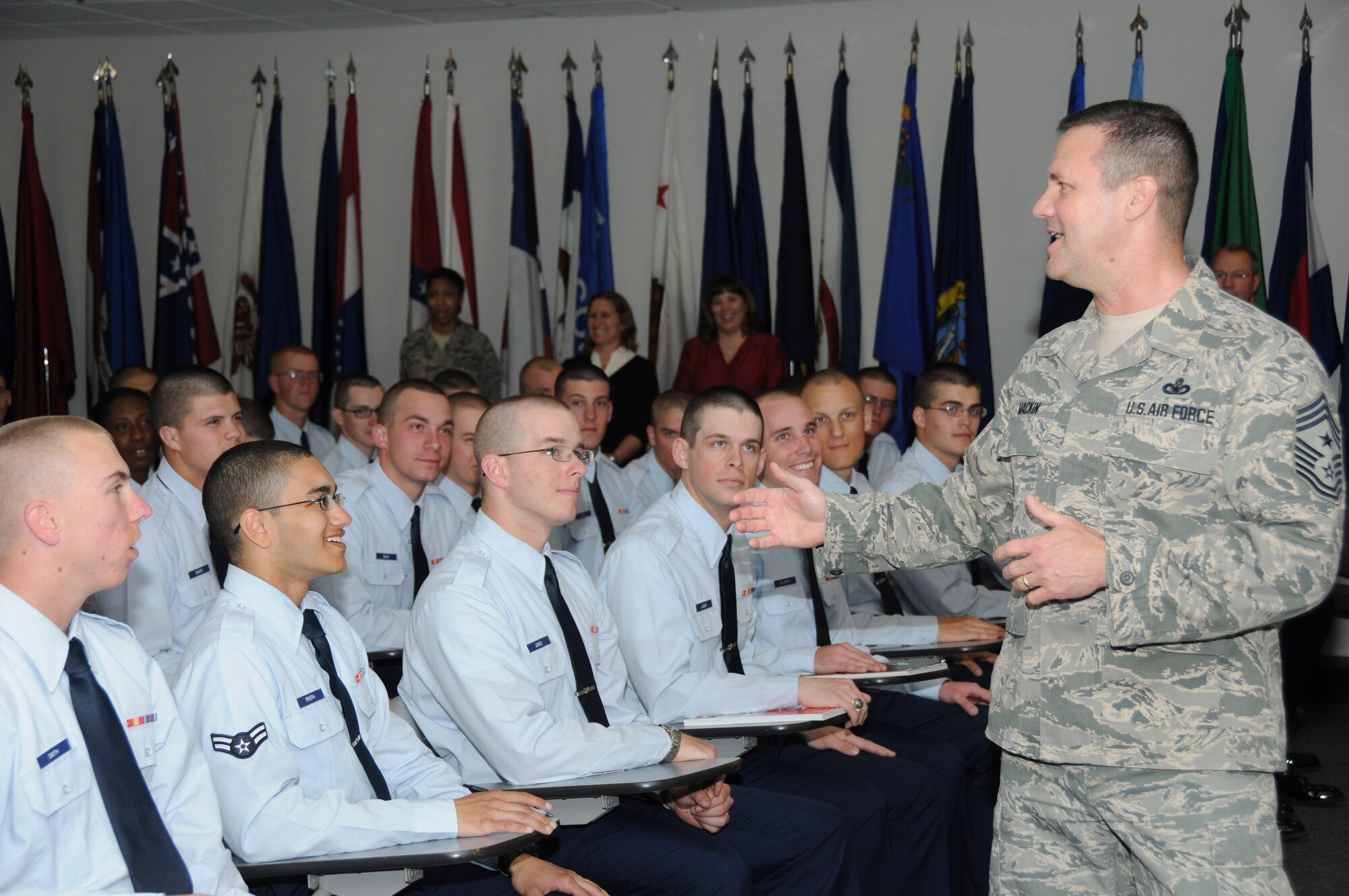 Chief Master Sgt. Oscar “Deno” Mackin, 2nd Air Force command chief, welcomes incoming students to the base Jan. 31, 2012, at the Levitow Training Support Facility, Keesler Air Force Base, Miss.  Keesler is home to 2nd Air Force headquarters and the first of six bases the new command chief is scheduled to tour through June.  (U.S. Air Force photo by Kemberly Groue)