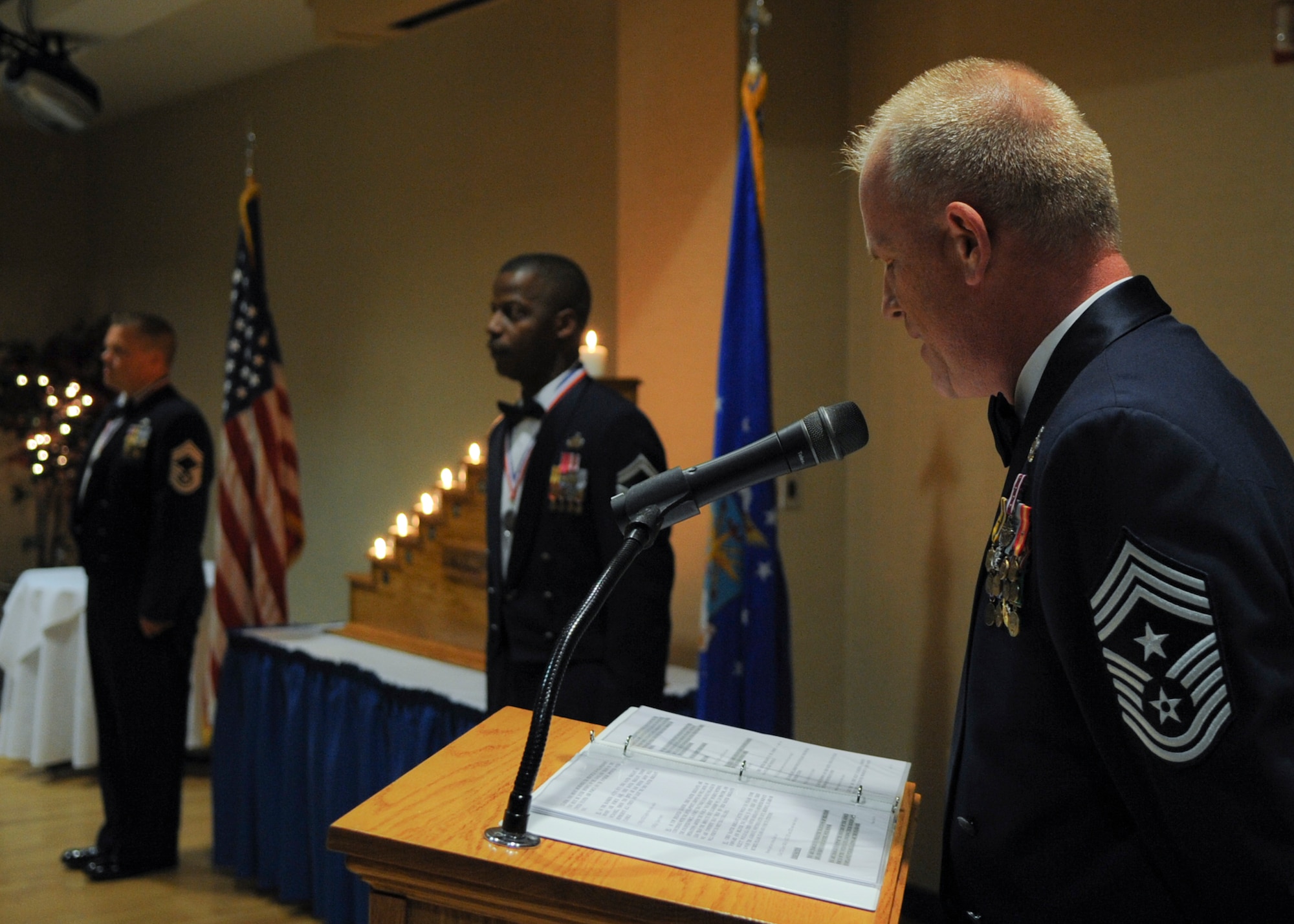 U.S. Air Force Chief Master Sgt. Frank Batten, 23d Wing command chief, recites the Chief Master Sergeant Charge during a Chief Recognition Ceremony at Moody Air Force Base, Ga., Feb. 4, 2012. Three Moody members were promoted to the highest enlisted rank. (U.S. Air Force photo by Airman 1st Class Olivia Dominique/Released)