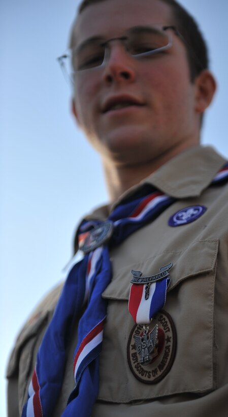 Connor McClellan, son of Col. James McClellan, 366th Maintenance Group commander, proudly displays his Eagle Scout medal, Feb. 3, 2012 at Mountain Home Air Force Base, Idaho. For McClellan’s final service project he successfully improved a garden and built a new stage for the Family Camp. (U.S. Air Force photo by Airman 1st Class Shane M. Phipps)