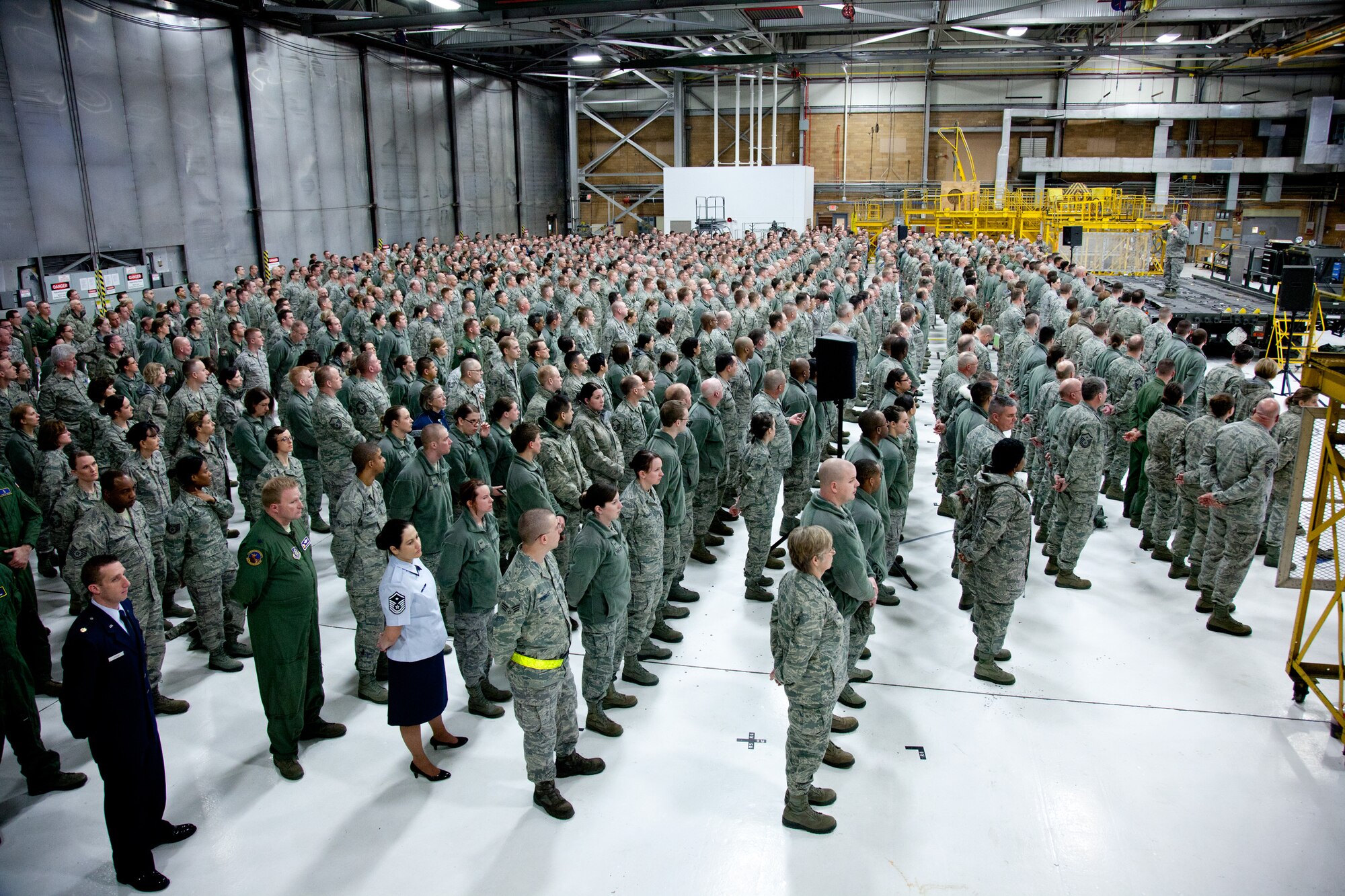 Members of the 934th Airlift Wing listen to commander Col. Darrell G. Young brief the recent force structure change announcement and how it may affect the 934th AW during a morning wing commander's call. (Air Force Photo/Shannon McKay)