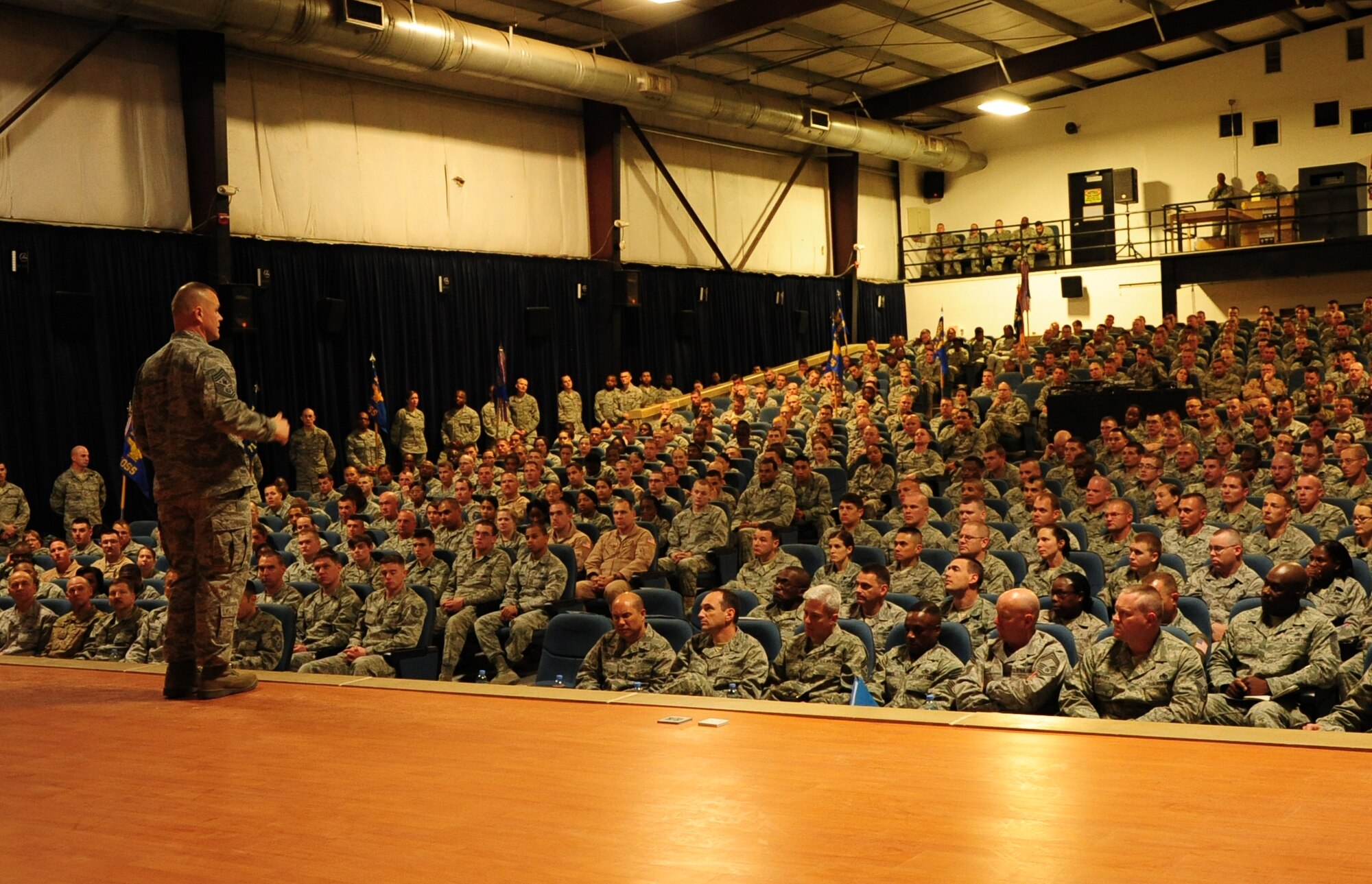 Chief Master Sgt. of the Air Force James Roy talks with deployed Airmen during an enlisted all-call at a base in Southwest Asia on Jan. 31, 2012. Roy’s visit to the installation marked the first stop on a tour of Southwest Asia. (U.S. Air Force photo/Senior Airman Michael Charles)