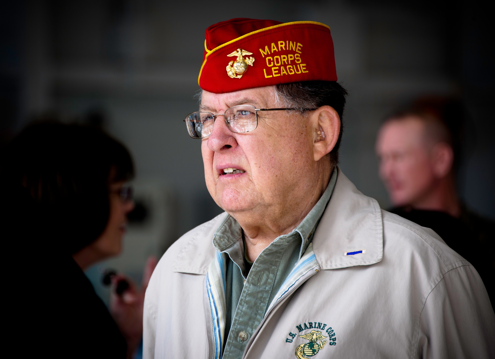 Duane St. John, a former Marine in 1950, watches the 2nd Marine Aircraft Wing Band, perform prior to the Marine Fighter Attack Training Squadron 501 change of command ceremony Feb. 3 at Eglin Air Force Base, Fla.  St. John fought in the Korean War and was wounded by enemy forces at the Battle of Chosin Reservoir. (U.S. Air Force photo/Samuel King Jr.)